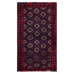 Rug & Kilim’s Modern Classics Tribal Rug in Indigo with Geometric Medallions