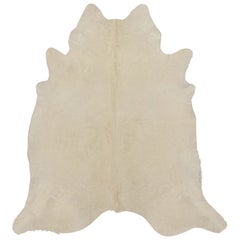 Rug & Kilim’s Modern Cowhide Rug in Off-White and Beige Tones