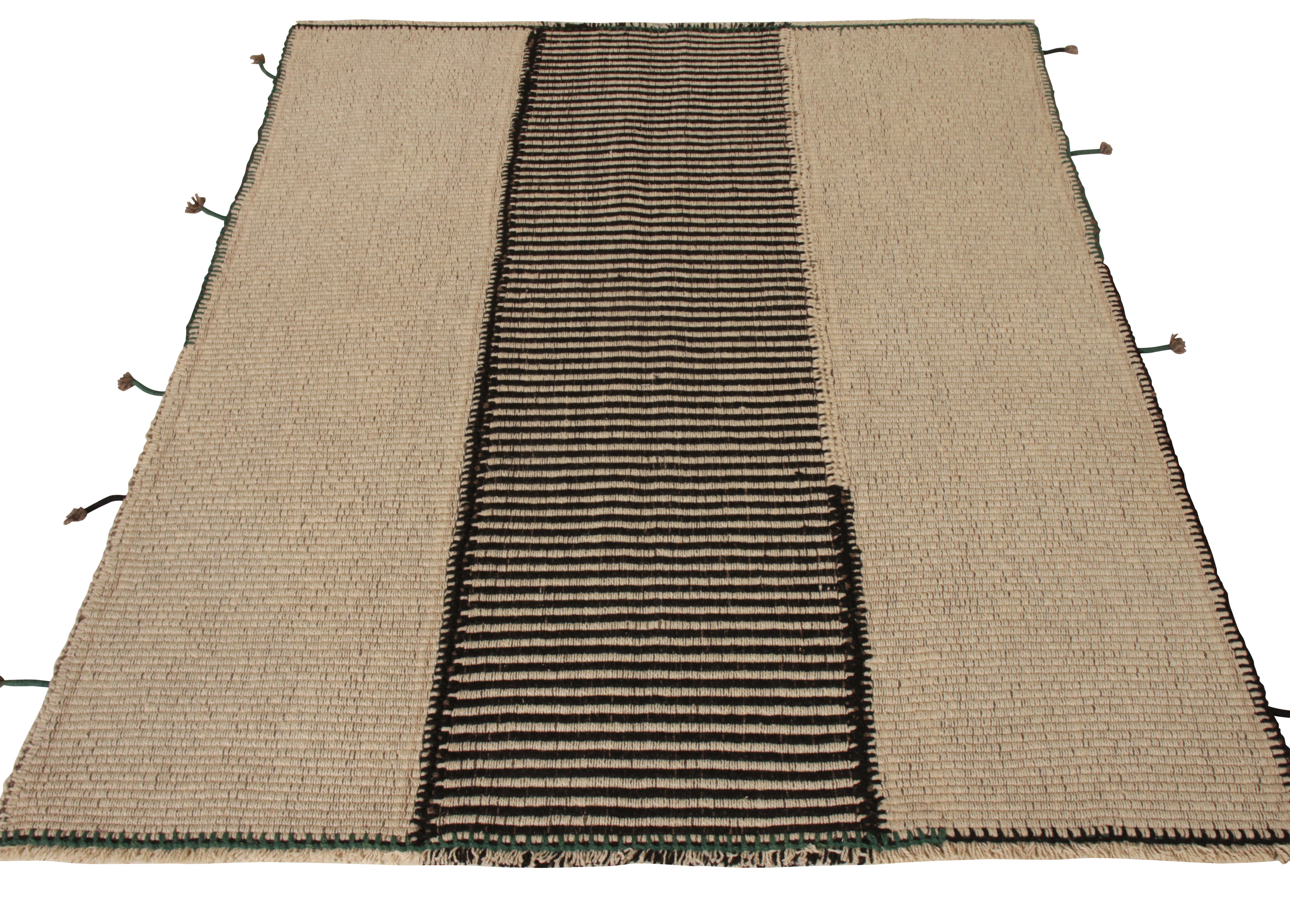 Rug & Kilim boasts its latest style of paneled Kilim rug with a unique textural look, now available for custom Kilim rug designs. Handwoven in wool with a striped, paneled style for an even spread on the floor, this 5x6 example combines