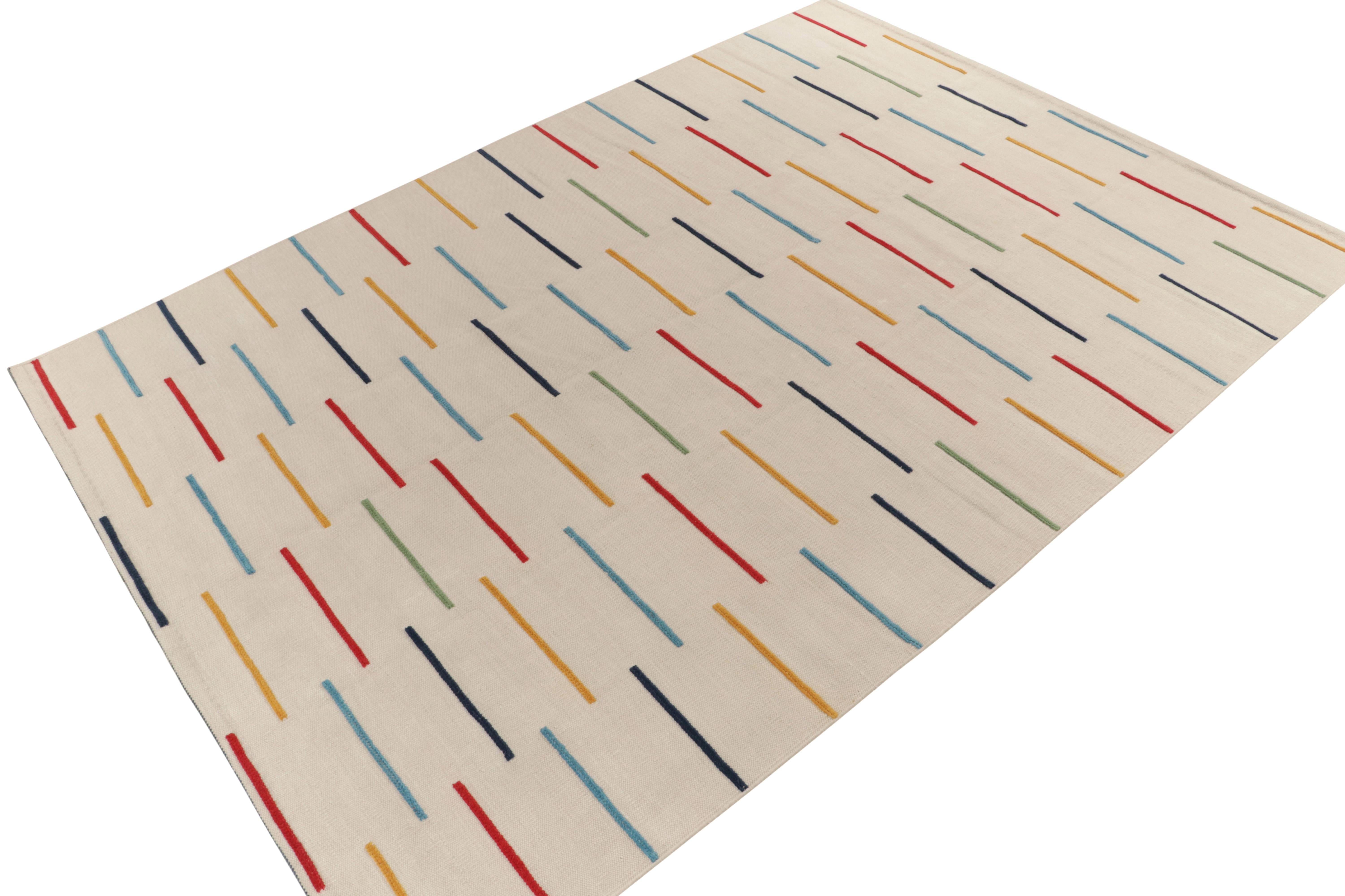 Rug & Kilim takes pride in presenting this 10x14 kilim design, inspired by a bold modern take on classic panel flat weaving. 

On the Design: This custom work features high-pile stripes in brightly colored blues, yellows, reds, and greens on the