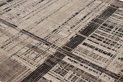 Rug & Kilim’s Modern Distressed Geometric Rug in Beige/Brown White & Black Tones