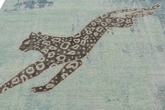 Rug & Kilim’s Modern Distressed Rug in Green and Blue with Leopard Pictorial