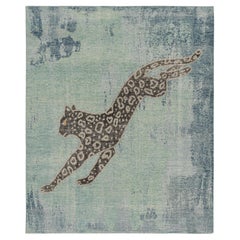 Alfombra moderna desgastada Rug & Kilim en verde y azul con dibujo de leopardo