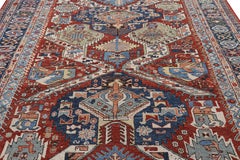 Rug & Kilim’s Modern Dragon Soumak Rug with Red and Blue Geometric Patterns