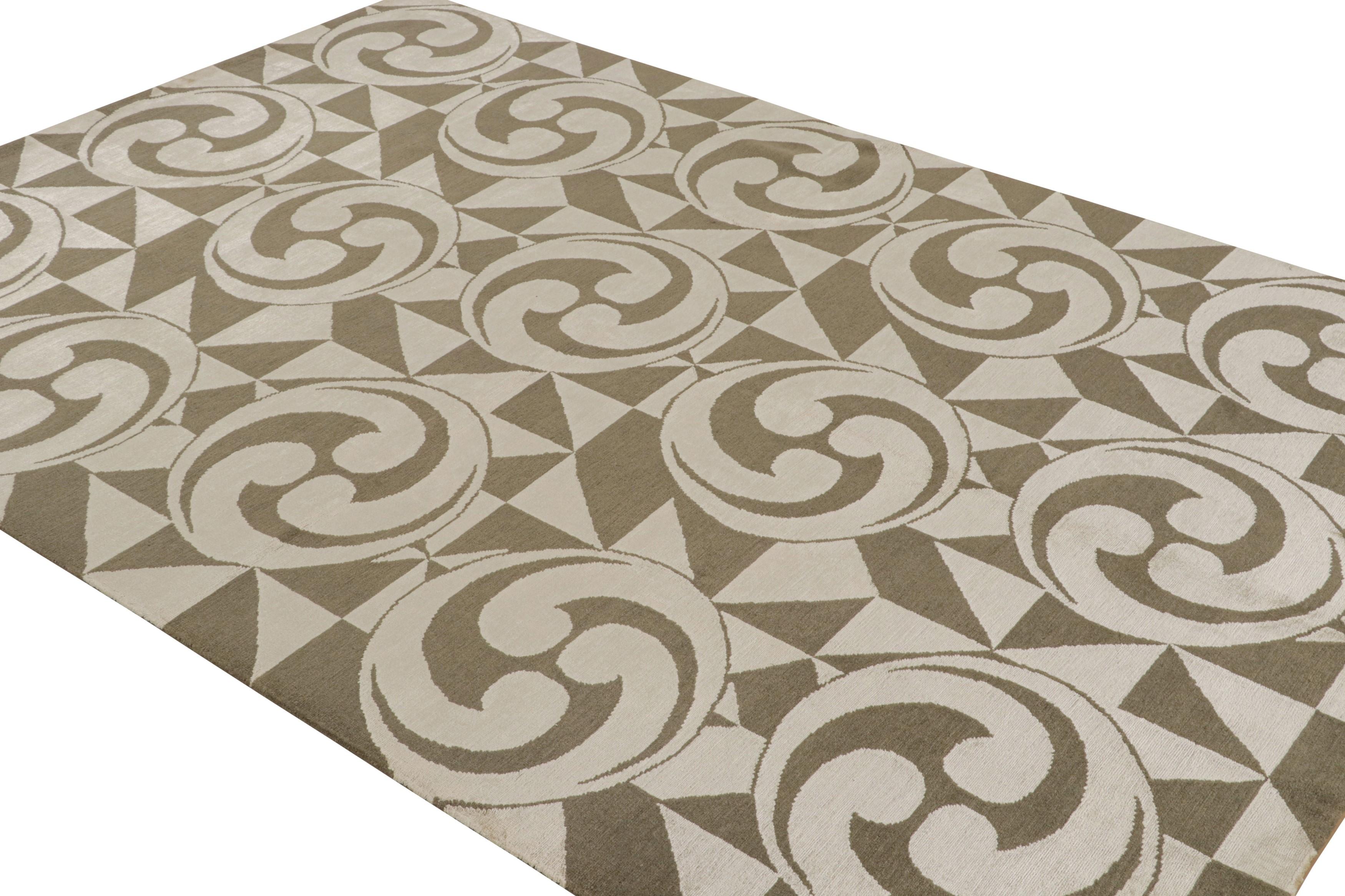 Dieser 6x9 große zeitgenössische Teppich aus handgeknüpfter Wolle und Seide ist Teil der Modern Collection'S von Rug & Kilim und zeichnet sich durch eine scharfe, dimensional ansprechende Geometrie aus, die durch eine reiche, warme Farbpalette aus