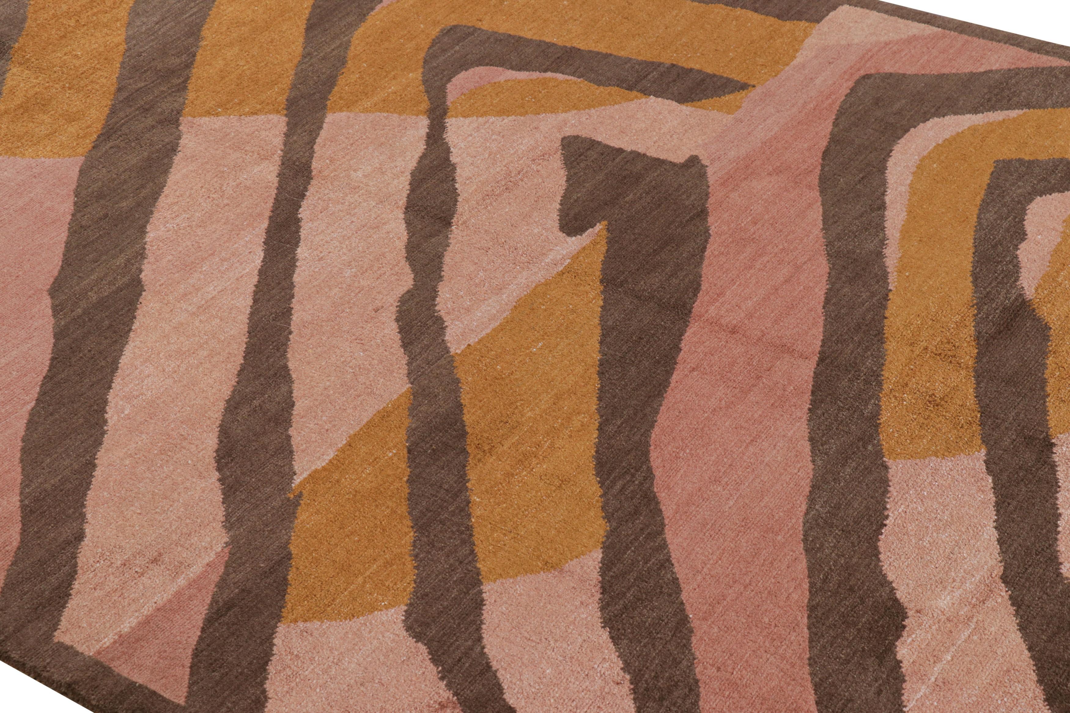 Made with hand-knotted wool and silk, this 6x7 contemporary rug joins the Modern Collection by Rug & Kilim—enjoying geometry complemented by a rich, warm pallet of brown, pink and gold hues.

On the Design: 

This contemporary design presents a bold