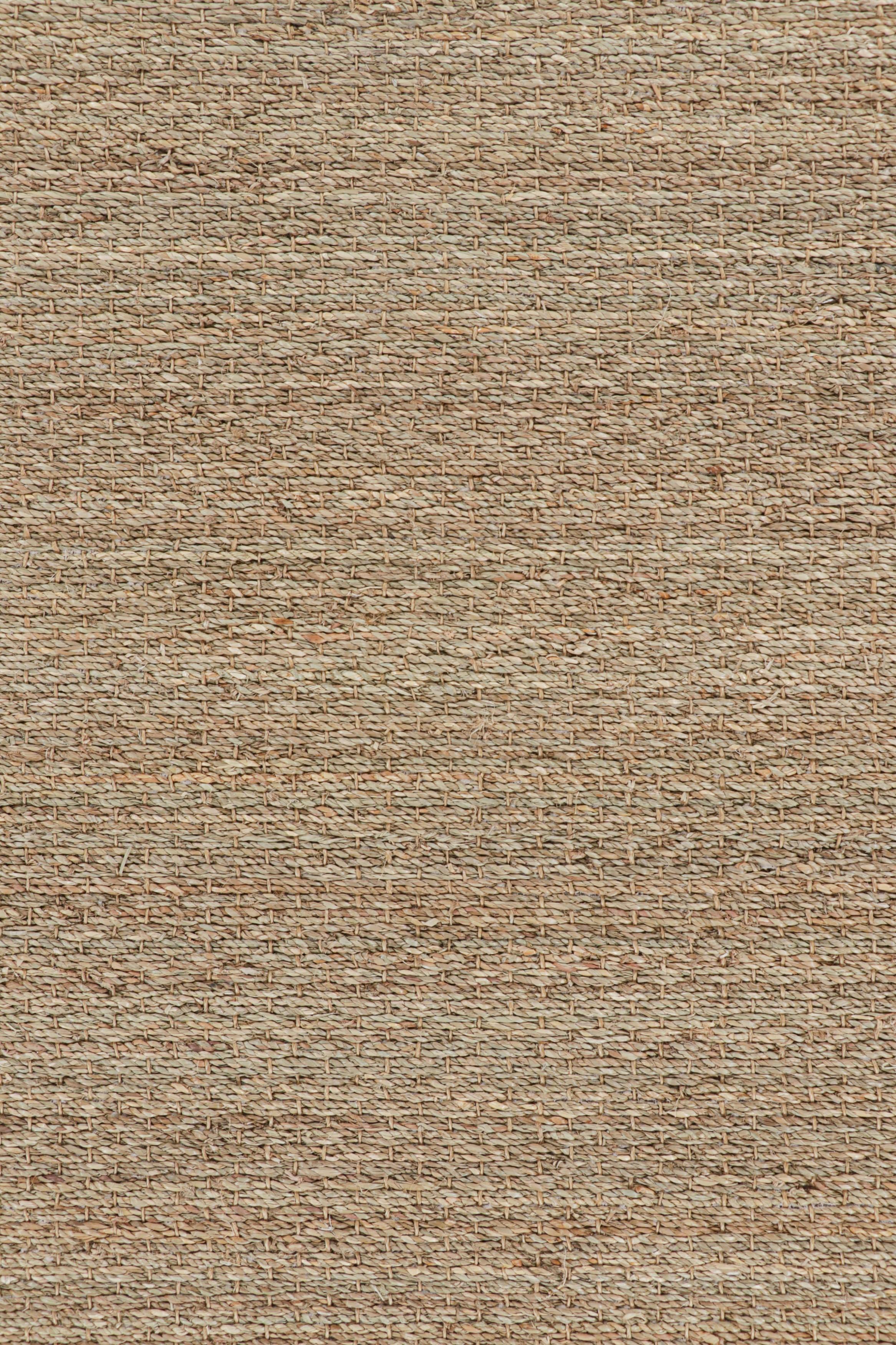 Tejida a mano con una trama plana de cáñamo, esta moderna alfombra de 3x9 de Rug & Kilim es un excepcional complemento sostenible para espacios modernos. 

Sobre el diseño: 

La paleta monocromática de este moderno tejido plano de cáñamo, realizado