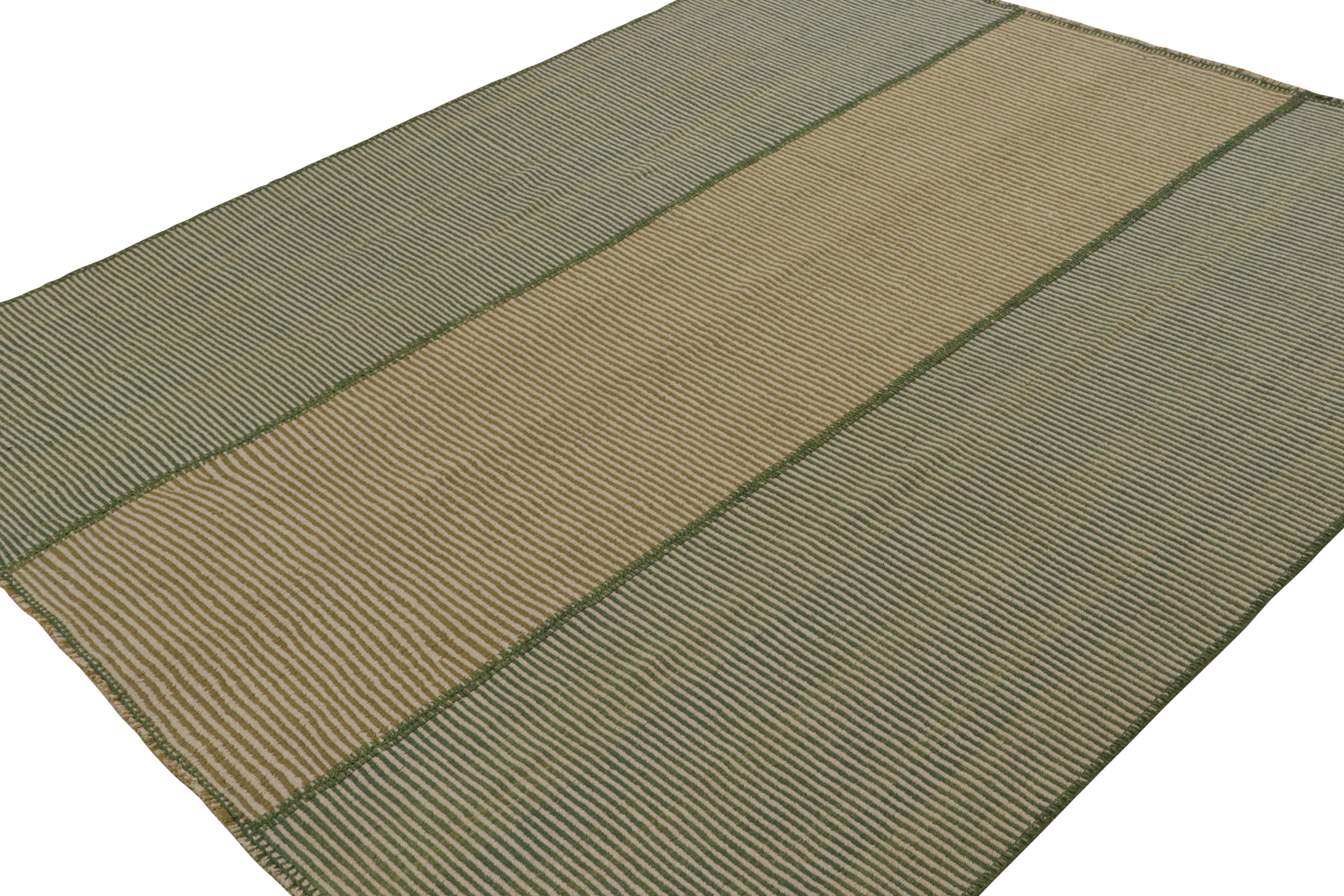 Handwoven in wool, a 9x11 Kilim design from an inventive new contemporary flat weave collection by Rug & Kilim.

On the Design: 

Fondly dubbed, “Rez Kilims”, this modern take on classic panel-weaving enjoys a fabulous, unique play of beige & green