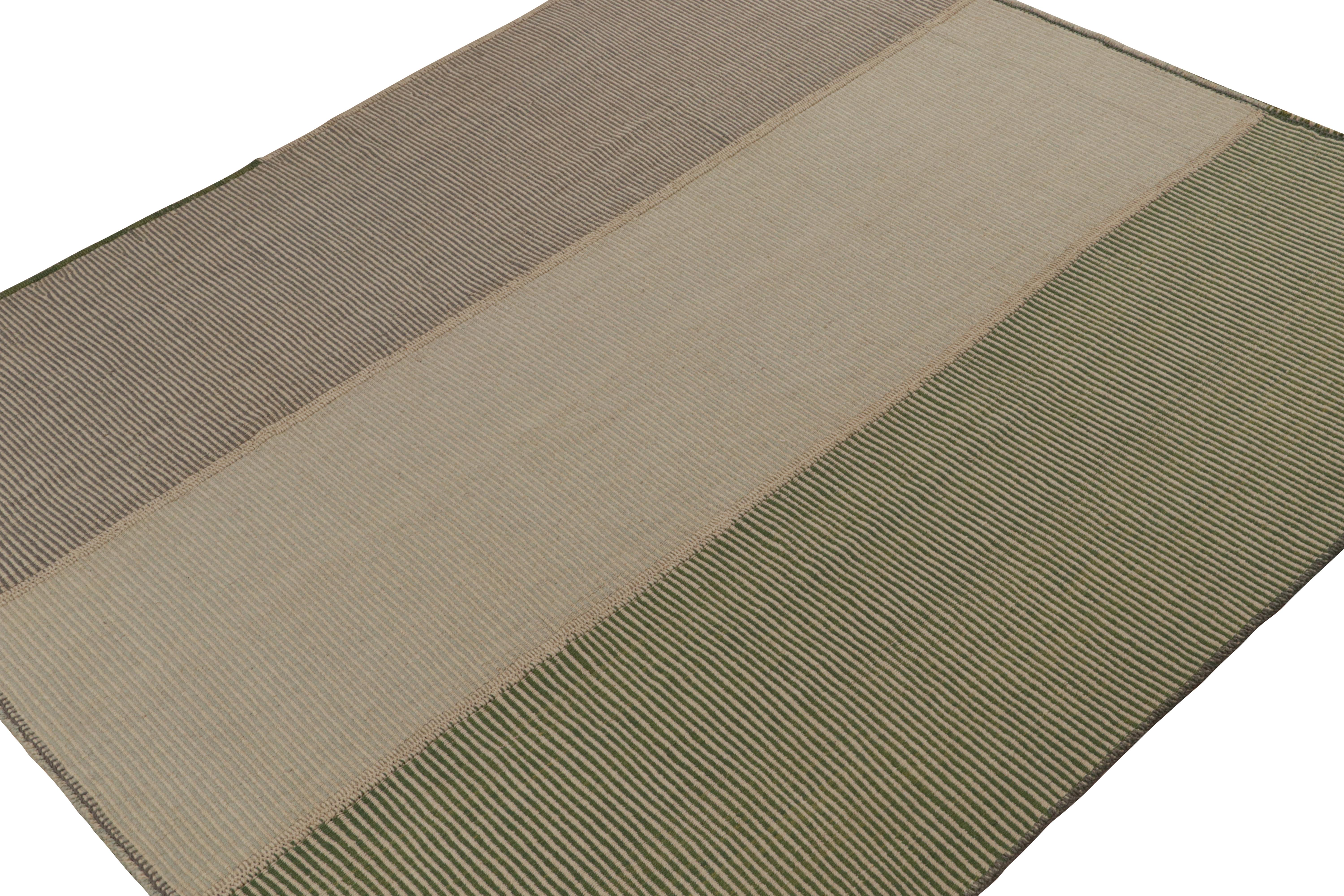 Handwoven in wool, a 9x10 Kilim from a bold new line of contemporary flatweaves by Rug & Kilim.

On the Design: 

Connoting a modern take on classic panel-weaving, our latest “Rez Kilim” enjoys beige, brown & green stripes. Keen eyes will admire how