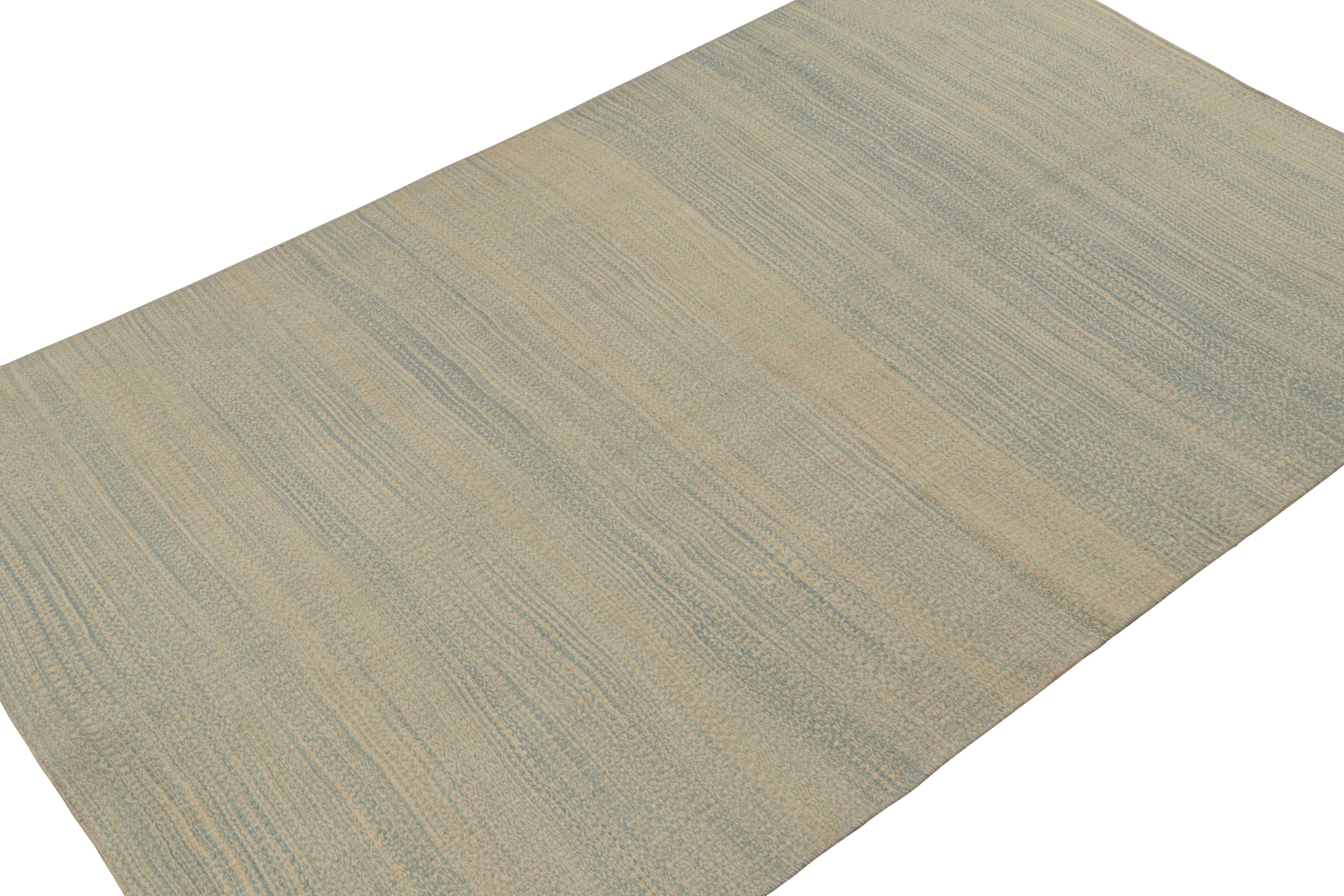 Handwoven in wool, this contemporary 6x10 kilim rug by Rug & Kilim is made in a modern ‘paddle weave’ flatweave style.

On the Design: 

This design enjoys a meticulous blend of yarns in an inventive take on plain styles with subtle blue and beige