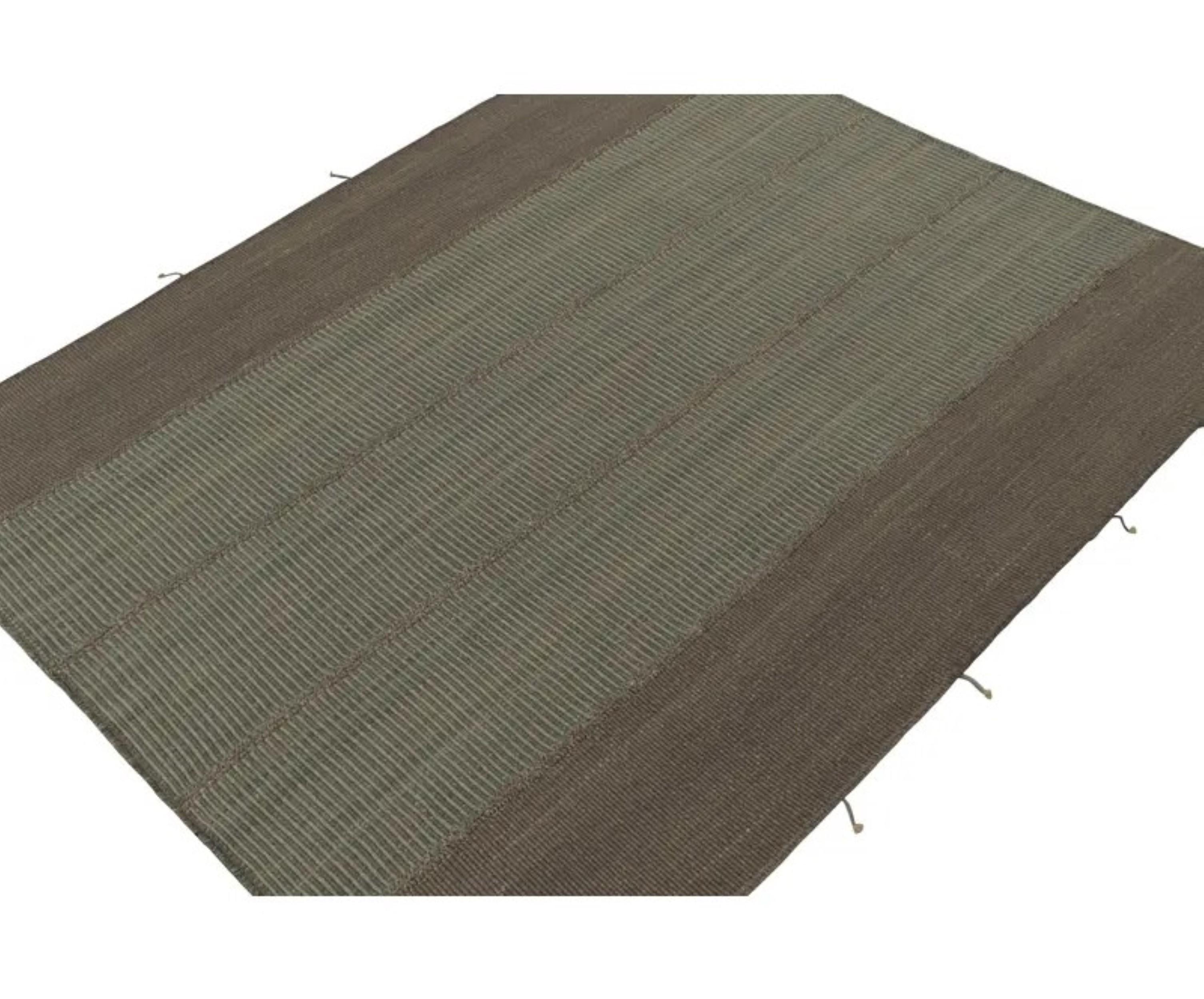 Handwoven in wool, an 8x10 Kilim from a bold new line of contemporary flatweaves by Rug & Kilim.

On the Design: 

Connoting a modern take on classic panel-weaving, our latest “Rez Kilim” enjoys brown & blue stripes. Keen eyes will admire how this