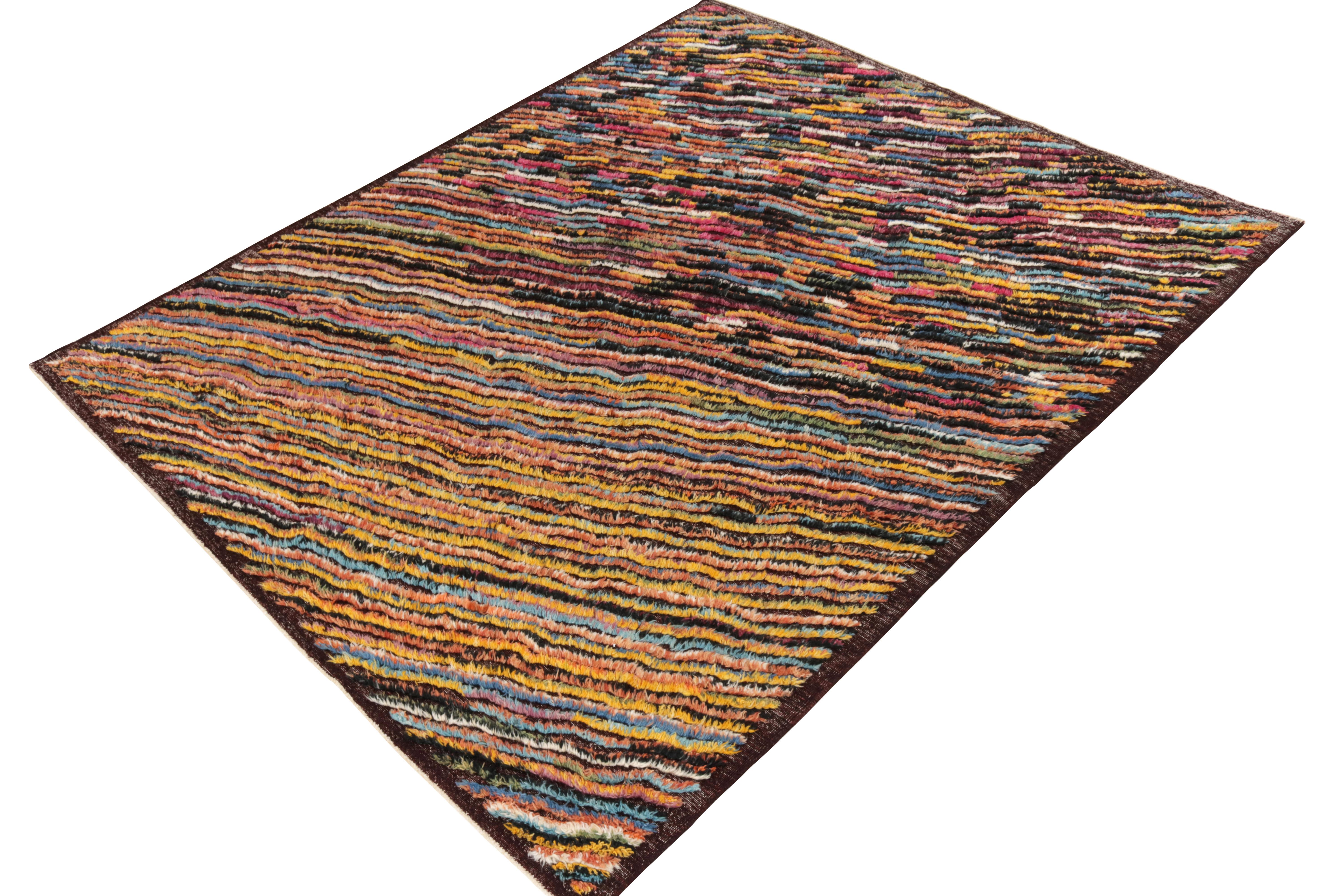 This contemporary 8x10 Kilim is a bold new addition to Rug & Kilim’s modern flat weave designs.

Handwoven in wool, this design favors a finely detailed play of textural stripes and polychromatic colors. Keen eyes will admire vibrant pinks, blues,