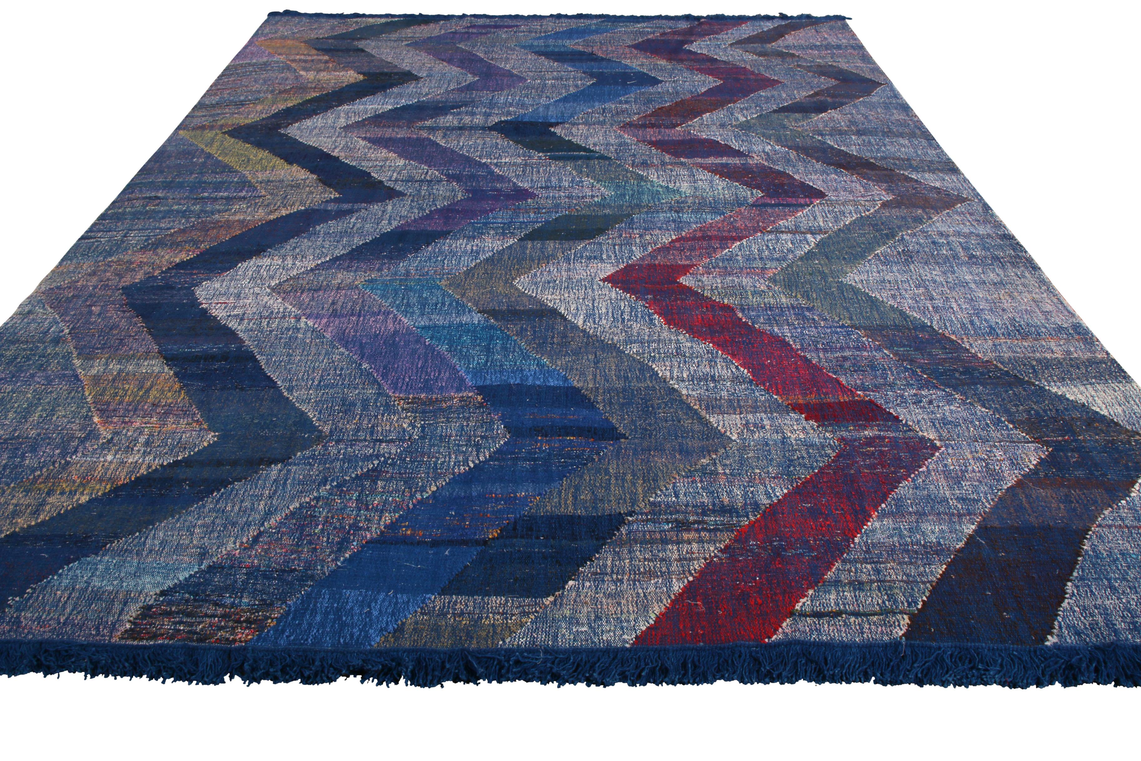 This modern Kilim represents a selection of distinct new patterns joining Rug & Kilim’s New and Modern collection, uniquely handwoven from the yarns of Classic textiles and Kilims lending to the eccentric variations in color and bold pattern each