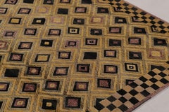 Rug & Kilim’s Moroccan-Inspired Rug, Gold with Black Diamond Geometric Patterns
