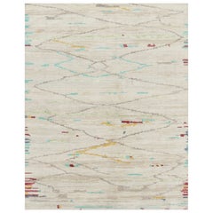 Rug & Kilim’s Modern Moroccan-Inspired Rug in Ivory and Teal Abstract Pattern