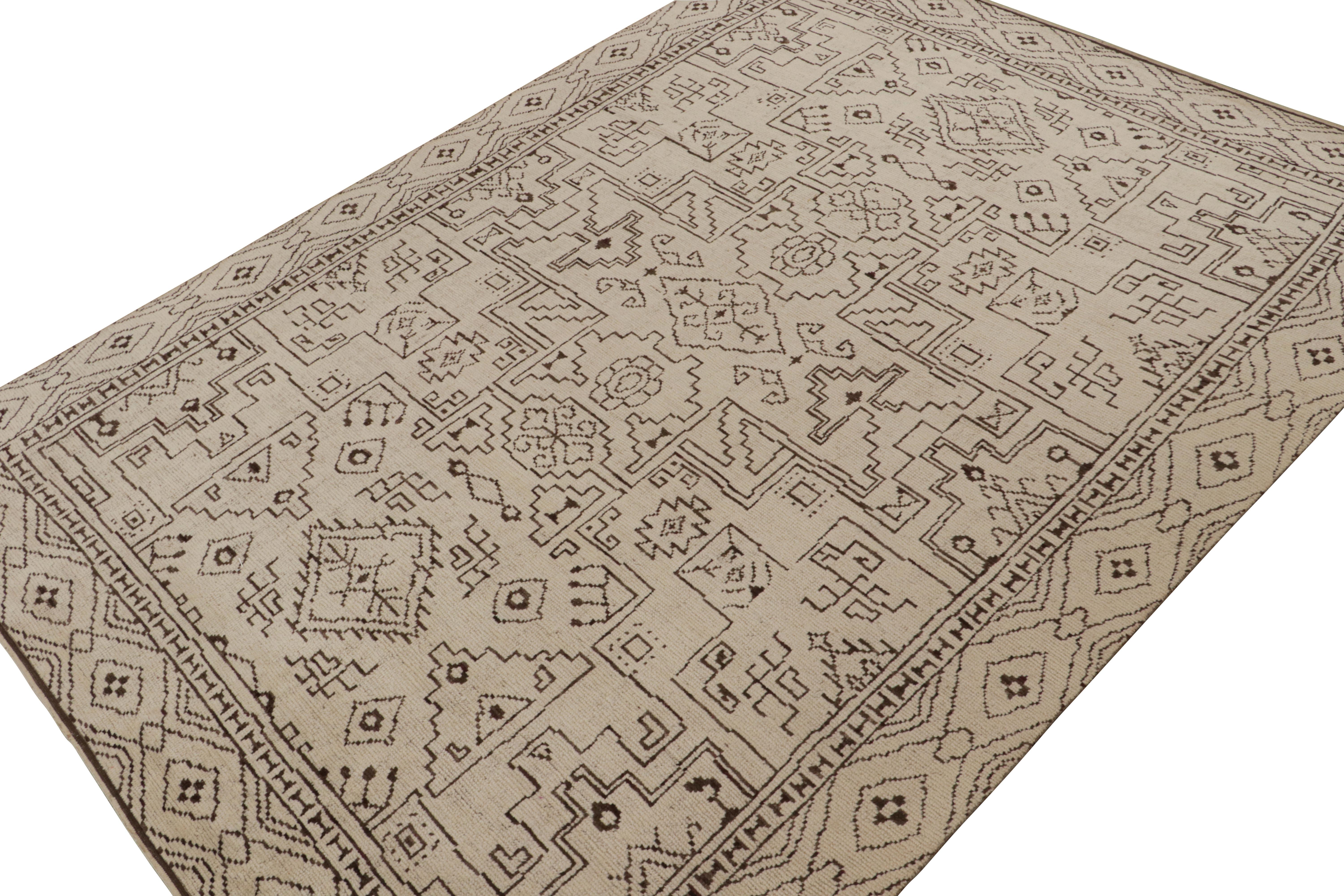 Hand-knotted in wool & cotton, this 10x14 rug is a new addition to the Moroccan Collection by Rug & Kilim. 

On the Design

This large sized rug enjoys a contemporary high-end approach to the Berber tribal rug style and primitivist geometric