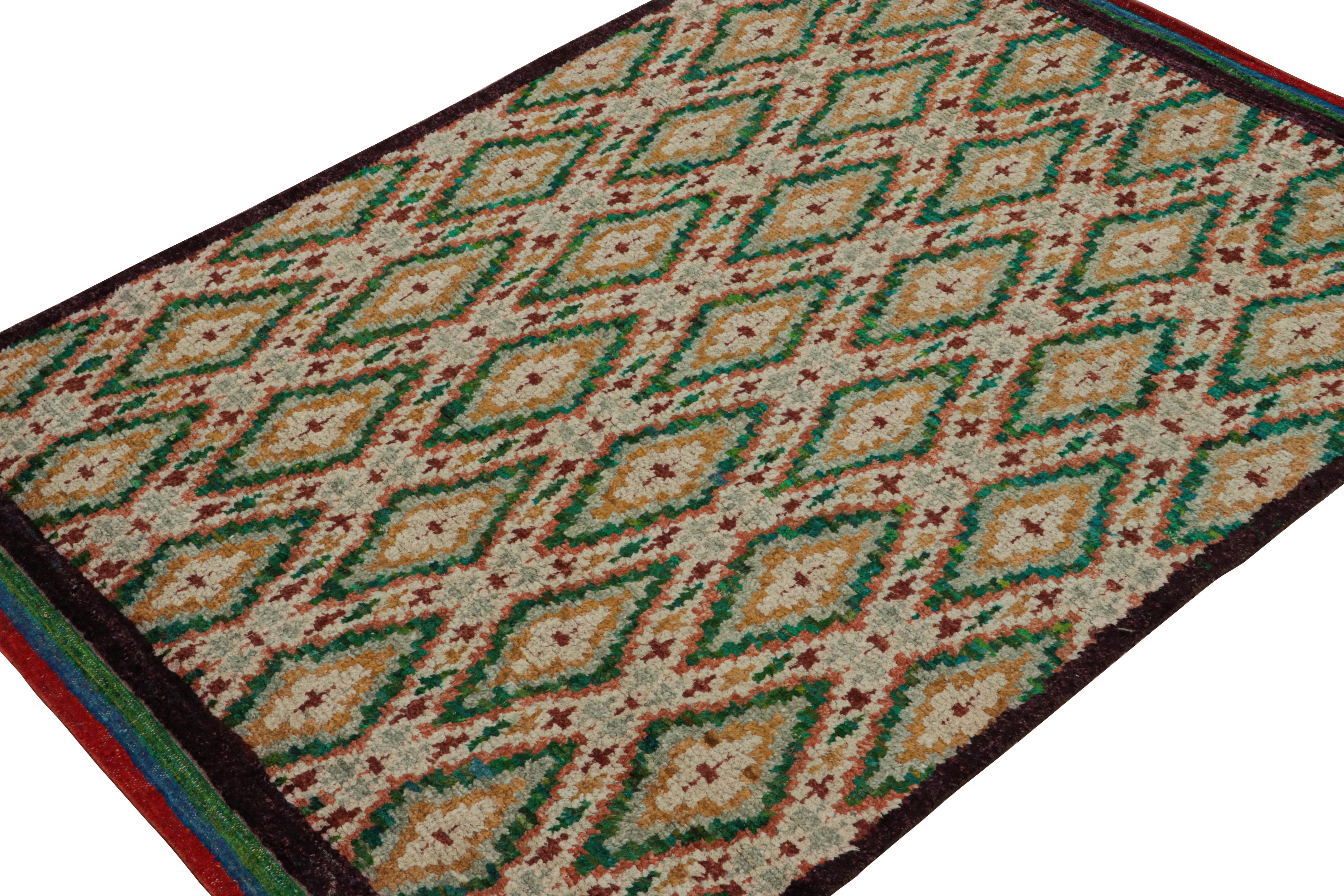 Hand-knotted in wool, silk & cotton, this 6x8 rug is a new addition to the Moroccan Collection by Rug & Kilim. 

On the Design

This rug enjoys primitivist style with patterns in tones of green, gold, red & black. Connoisseurs will admire this as a