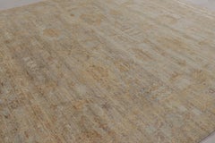 Rug & Kilim’s Modern Oushak-Inspired Rug in Pale Gray & Soft Gold Floral Pattern