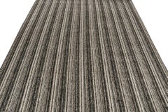 Rug & Kilim’s Modern Oversized Rug in Salt-and-Pepper Stripes