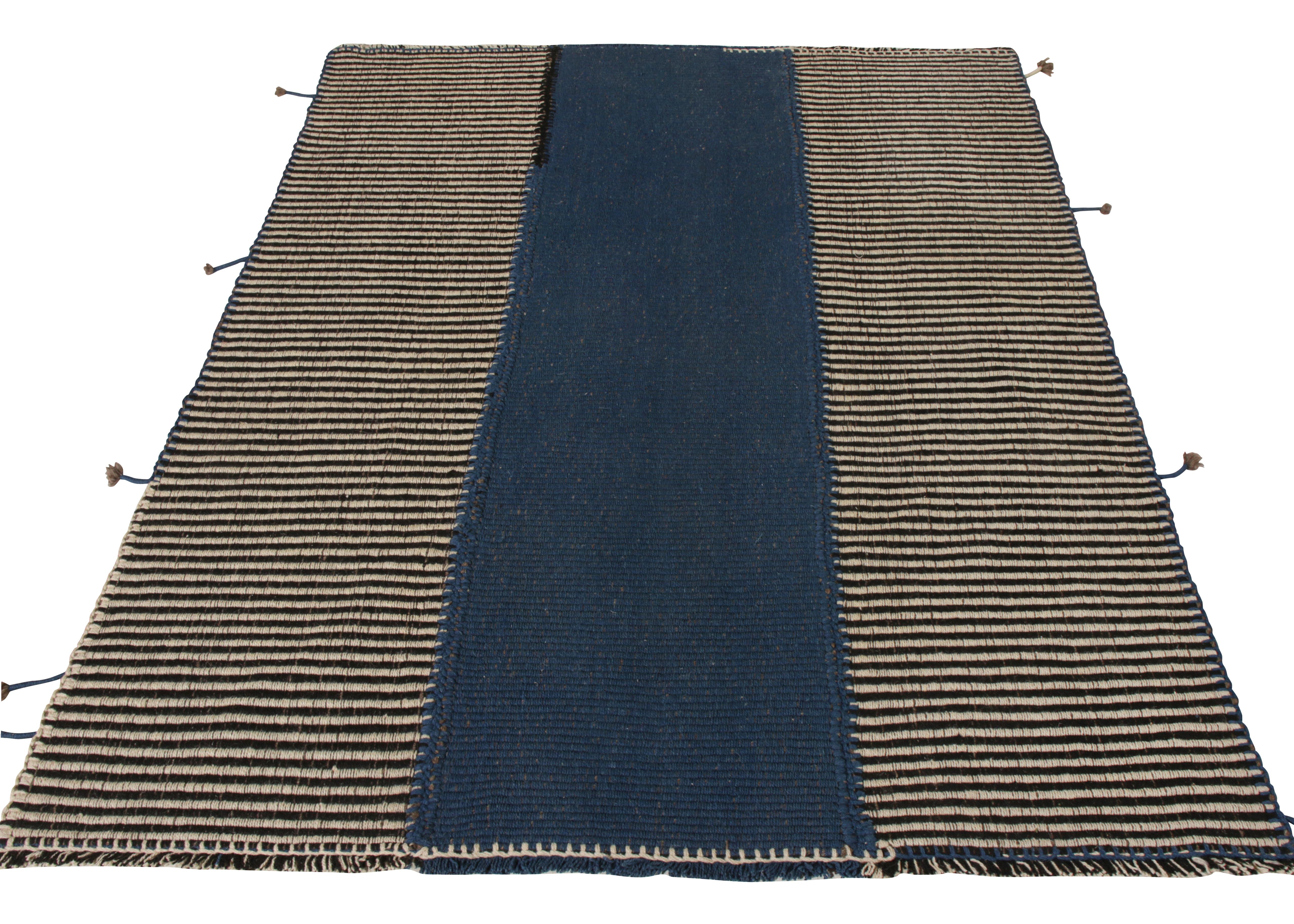 Rug & Kilim introduces a distinctive take on textural Kilims to its collection with this 5x7 addition. Flatwoven in wool in a distinctive paneled style, this modern Kilim features a rare marriage of technique and striation on panels in lush
