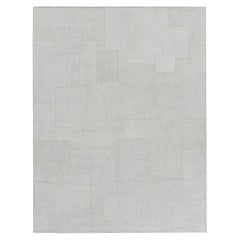 Rug 
Kilim è un moderno kilim patchwork con motivi geometrici bianchi e blu.