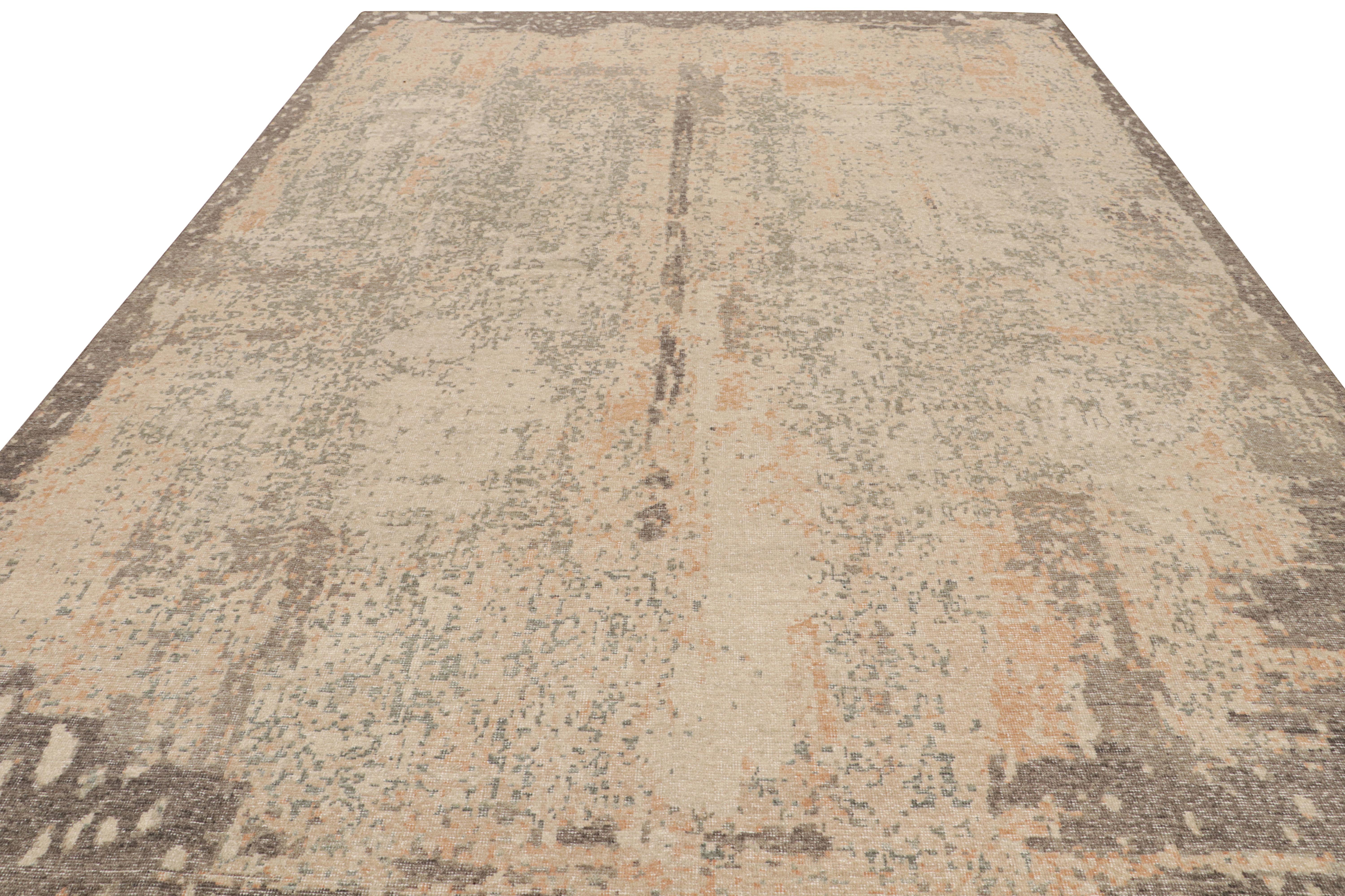 Hand-knotted in wool, this 10x14 distressed abstract rug in more contemporary colors of beige/brown, rust and gray, features an all over pattern like that of an abstract watercolor painting. 

On the Design: 

This piece enjoys a contemporary