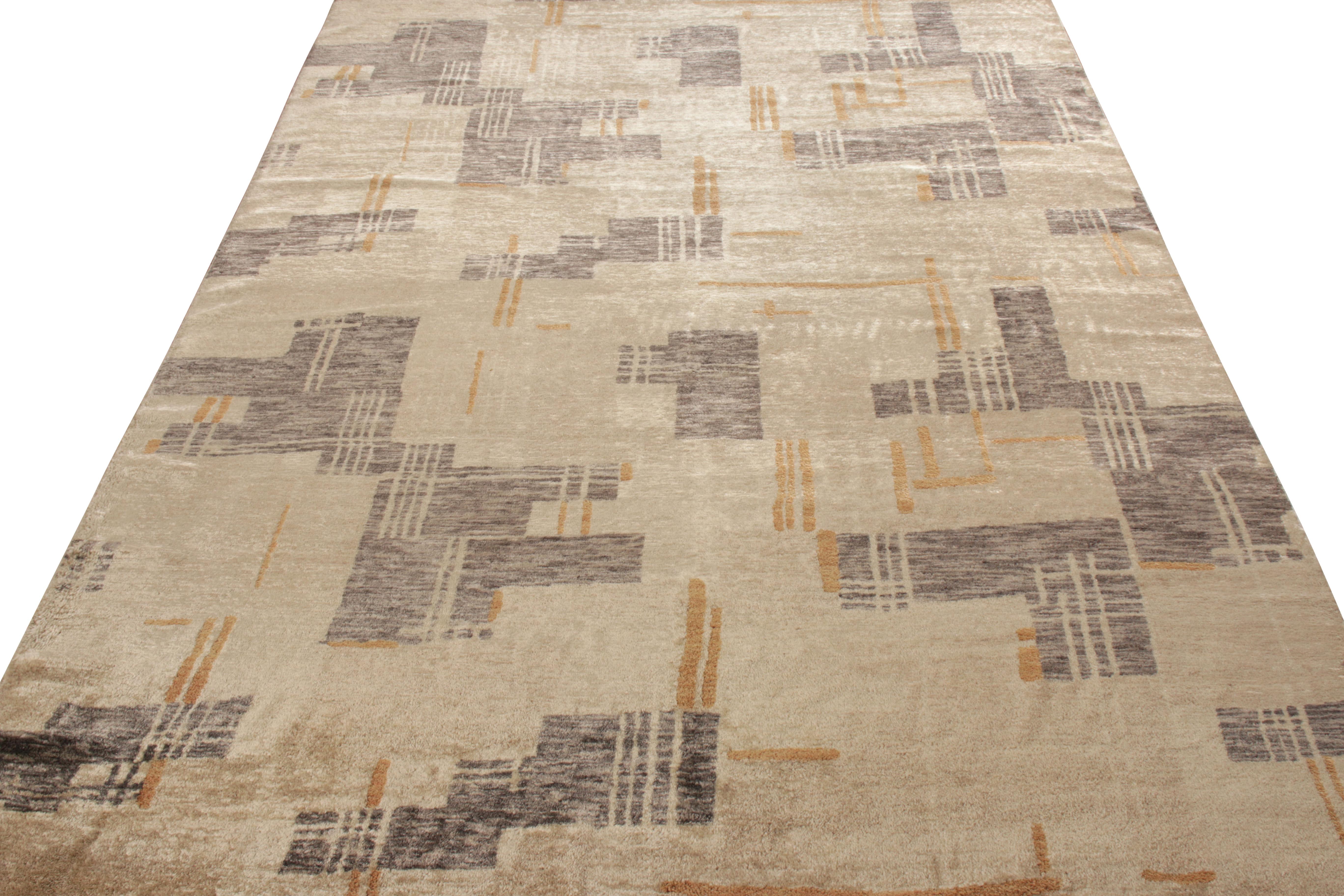 Hand knotted in wool and exotic yarn, this 6×9 abstract rug joins Rug & Kilim’s bold Modern Collection. Featuring a contemporary take on mid-century themes, the rug witnesses an all over geometric pattern in luscious shades of beige-brown and gray