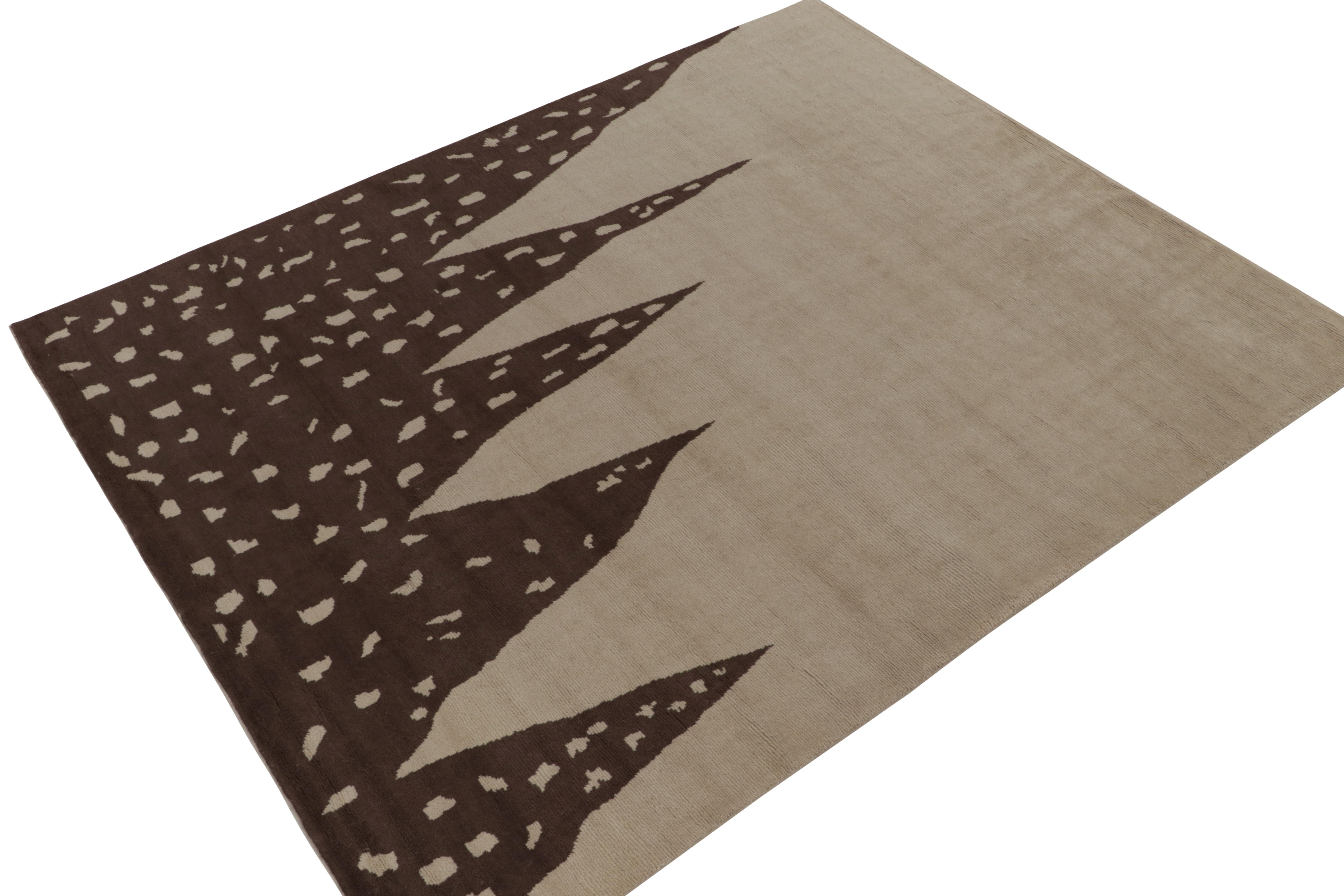 Hand-knotted in luxurious wool, a new 8x10 abstract rug from oRug & Kilim’s bold modern selections. The dual patterns bring the piece to life with an unusual play of comfortable beige-brown with a fabulous juxtaposition of solid color and