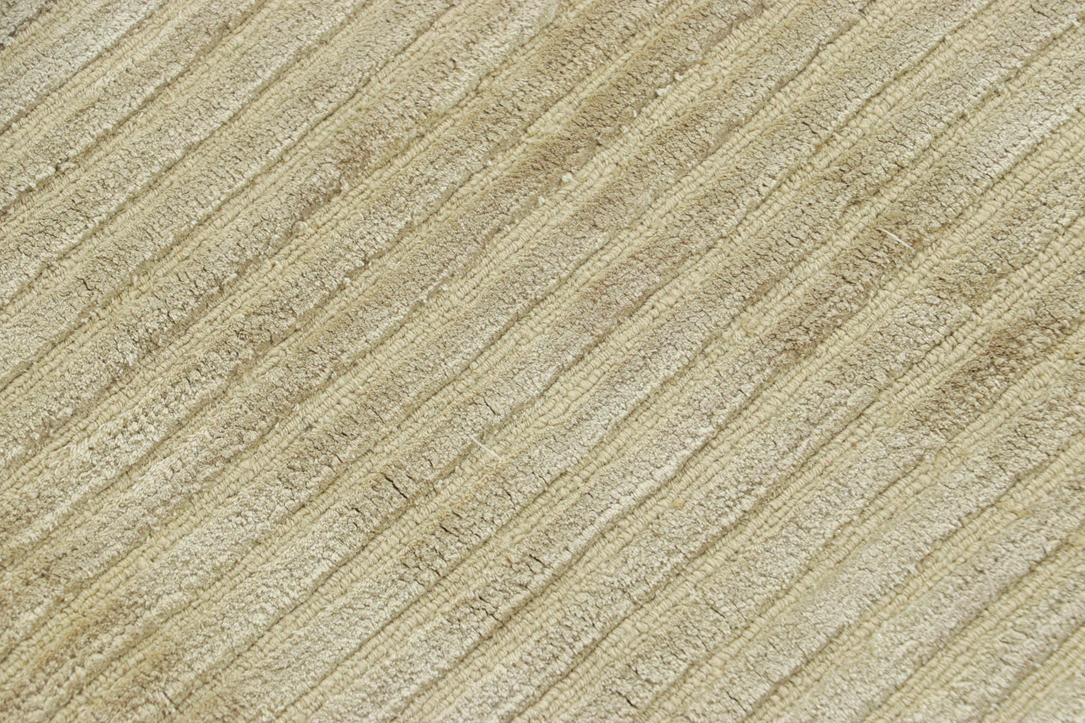 Made with hand-knotted wool and silk, this 3x4 contemporary rug is an exciting addition to the Textural rug collection by Rug & Kilim. This particular line features a subtle high-and-low element with ribbed texture married to minimalist stripes—made