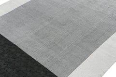 Tapis moderne de Rug & Kilim aux motifs géométriques noirs et blancs