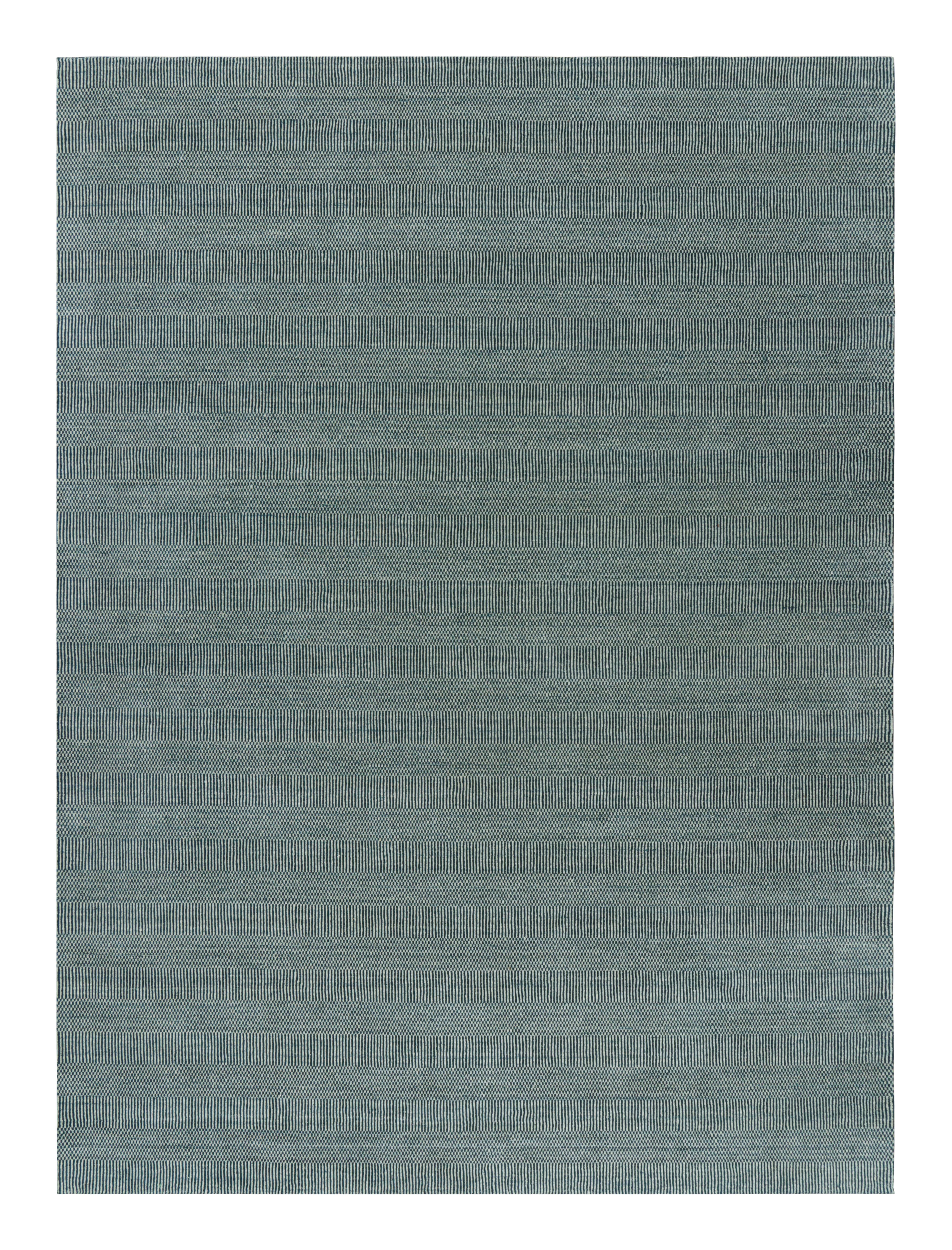This wool 10x14 rug is a new addition to Rug & Kilim’s Modern Collection, and represents a new series of custom-capable contemporary designs. 

On the Design: 

The all over pattern is a play of stripes and geometric patterns together, which play