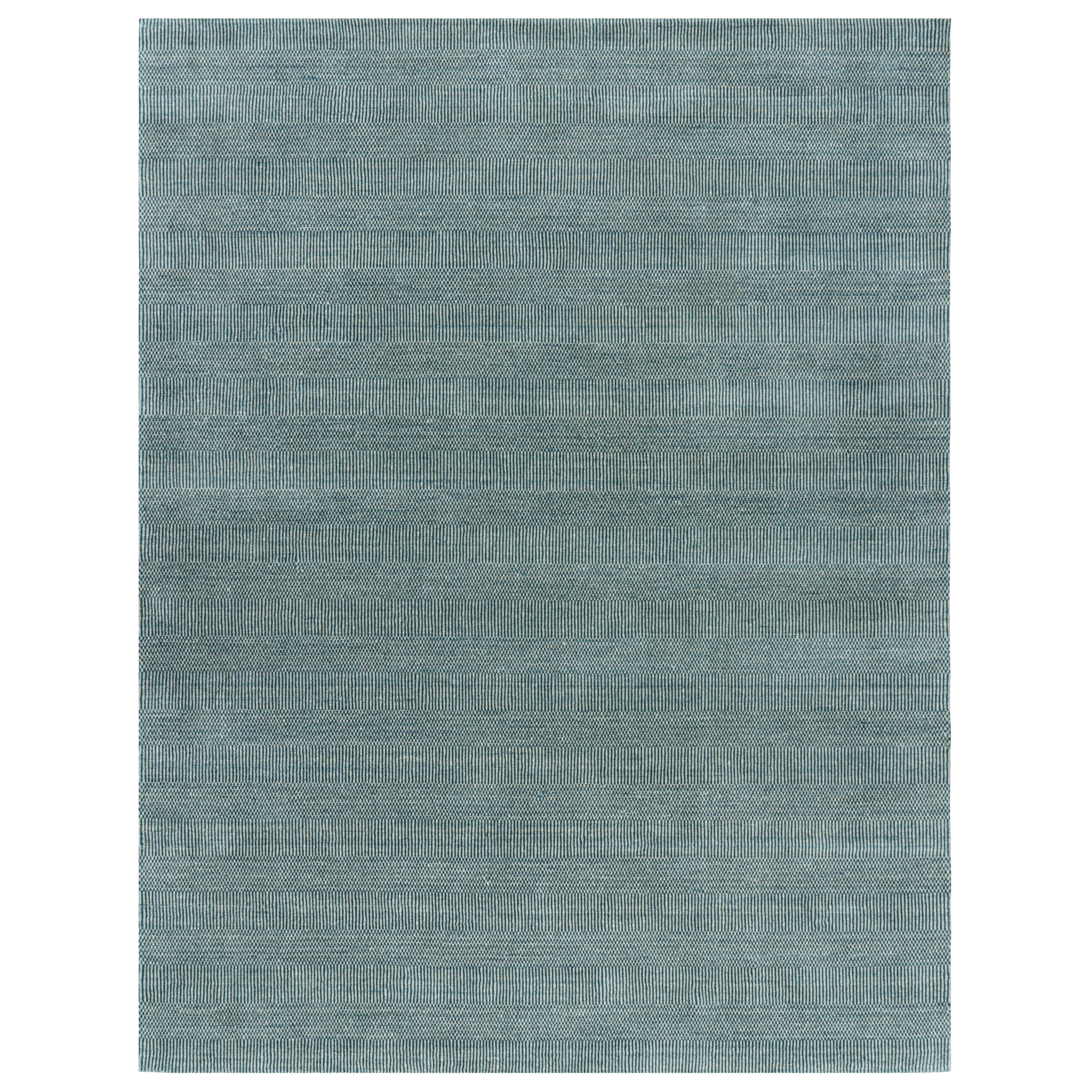 Tappeto moderno Rug
Kilim in blu e crema, con strisce e motivi geometrici