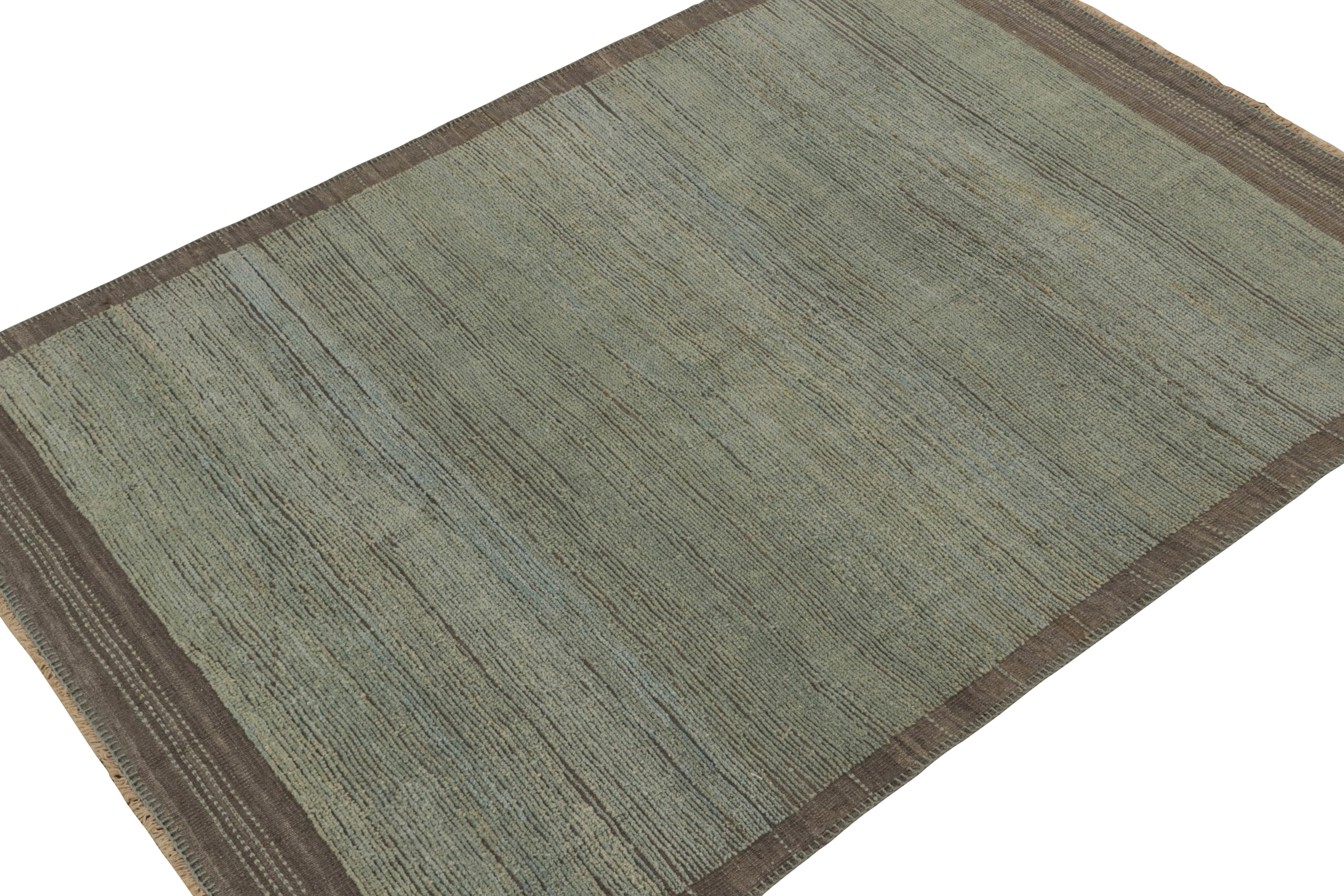 Handwoven in wool, this 6×8 rug is from a bold new line of contemporary rugs by Rug & Kilim.

Further On the Design:

This new addition to “Rez Kilim” is a play of pile and flat weave together in green, blue & brown. Additionally, this is the first