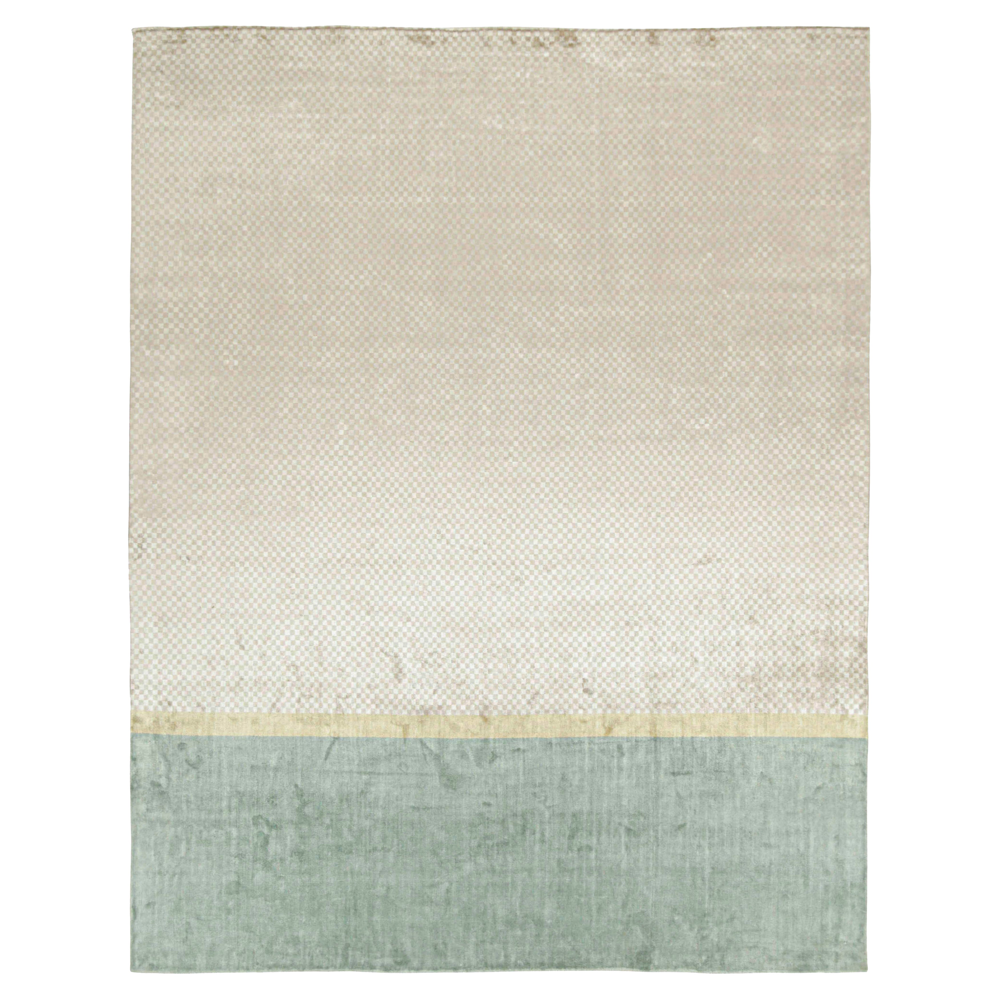 Tappeto moderno Rug & Kilim in blu con strisce dorate e motivo geometrico beige