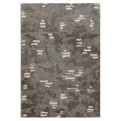 Alfombra moderna Rug & Kilim en gris marengo con motivos geométricos blancos
