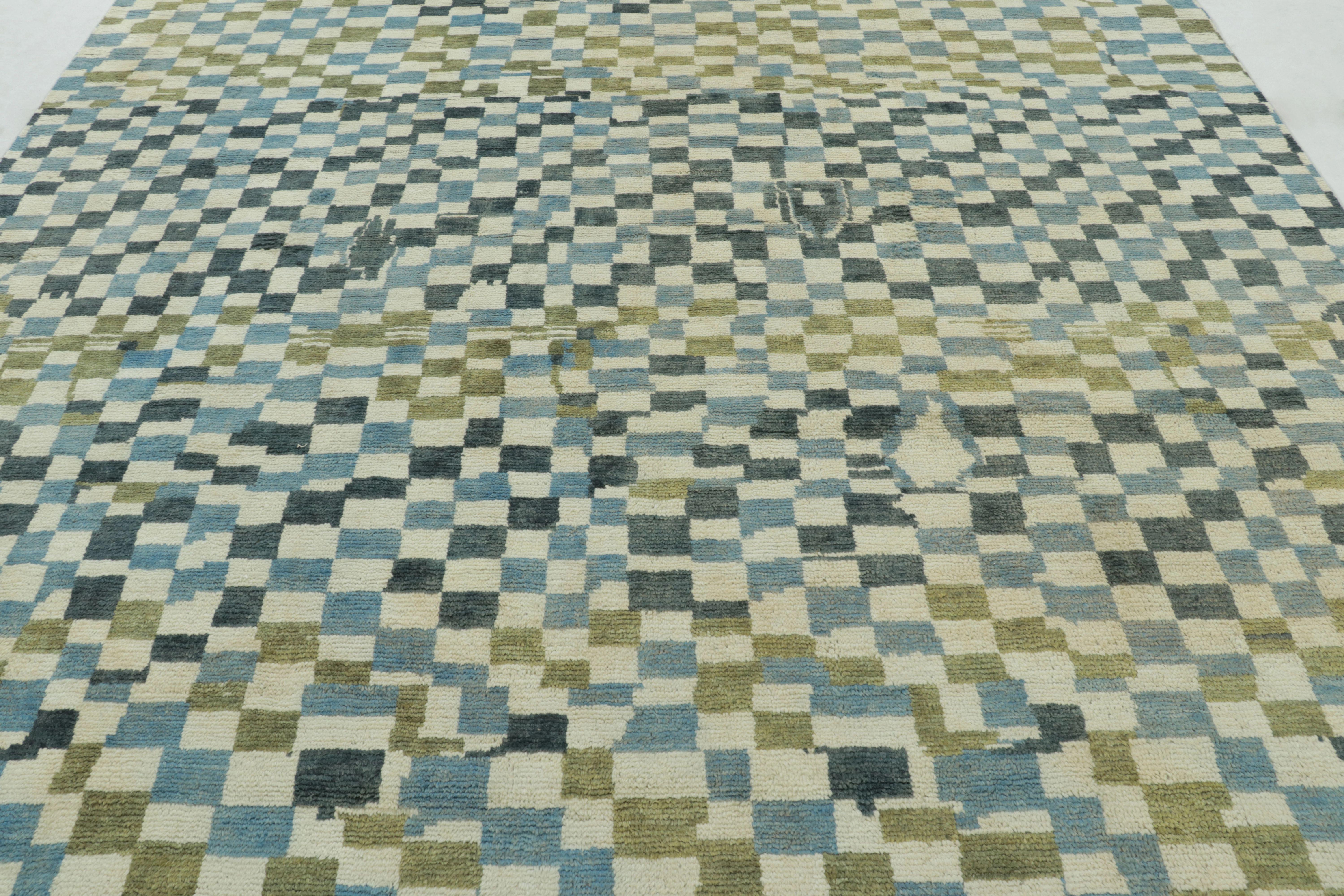 This magnificent 9x12 Abstract rug from Rug 
Kilim’s Modern Collection is a pixelated, textural work of art, hand-knotted in fine wool and silk. The design features an all-over mosaic of small, rectangular blocks in a vibrant, contemporary