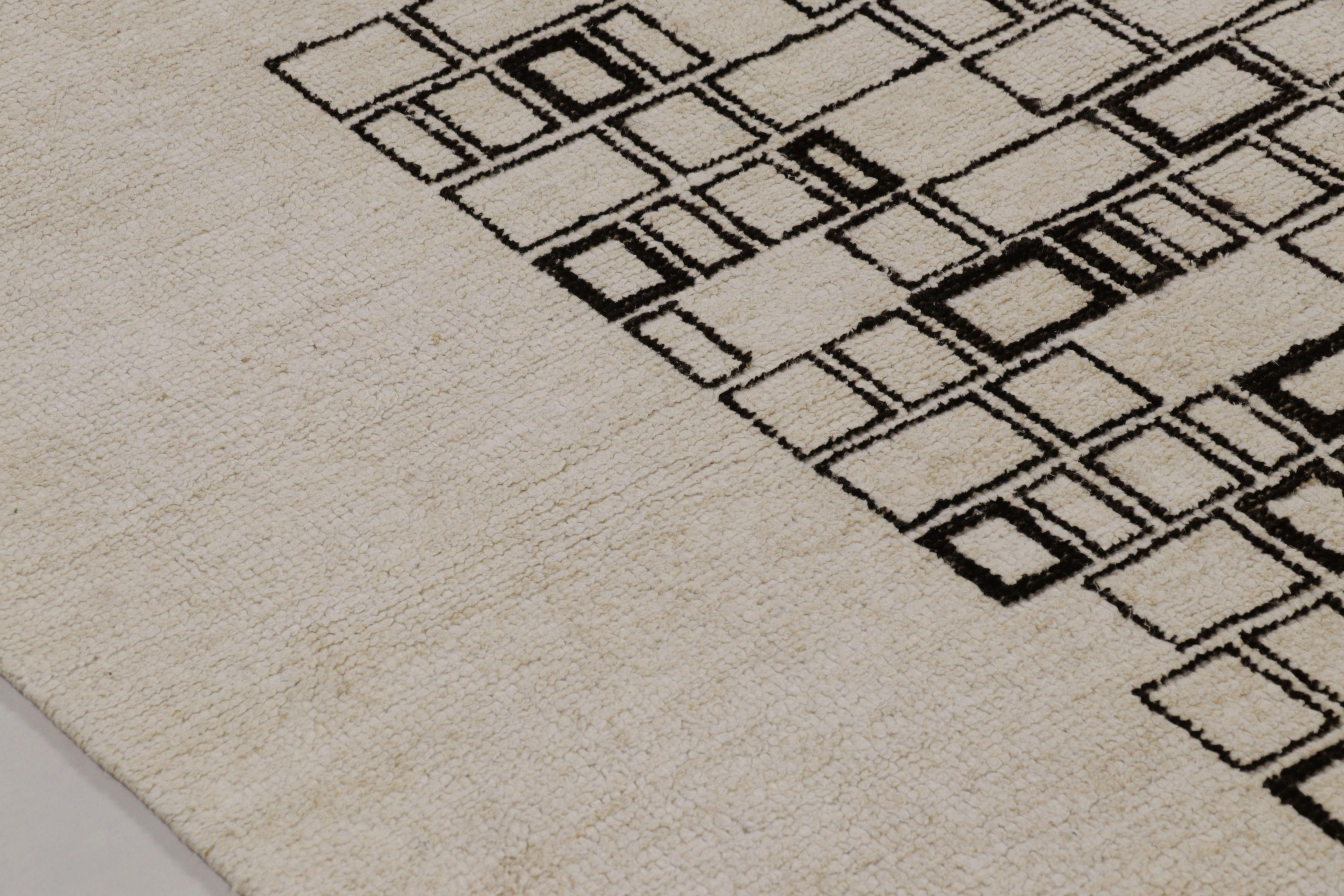Hand-knotted in fine wool, this unique 9x11 rug is an exclusive and
new addition to Rug 
Kilim's Modern Collection. This design showcases a singular, abstract concept that emphasizes graphic minimalism and visual texture.

On the Design:

This