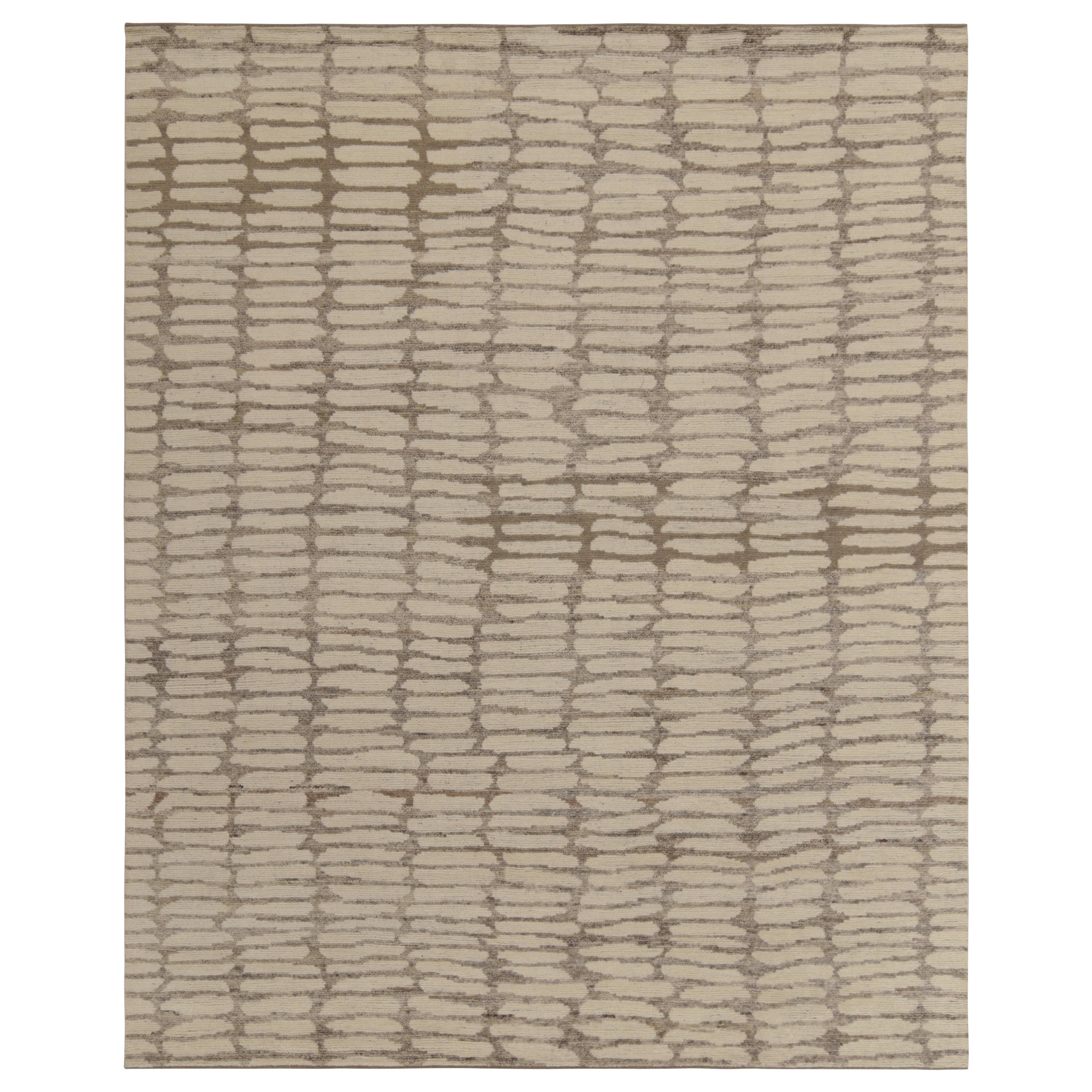 Alfombra moderna Rug & Kilim en gris con motivos geométricos blancos