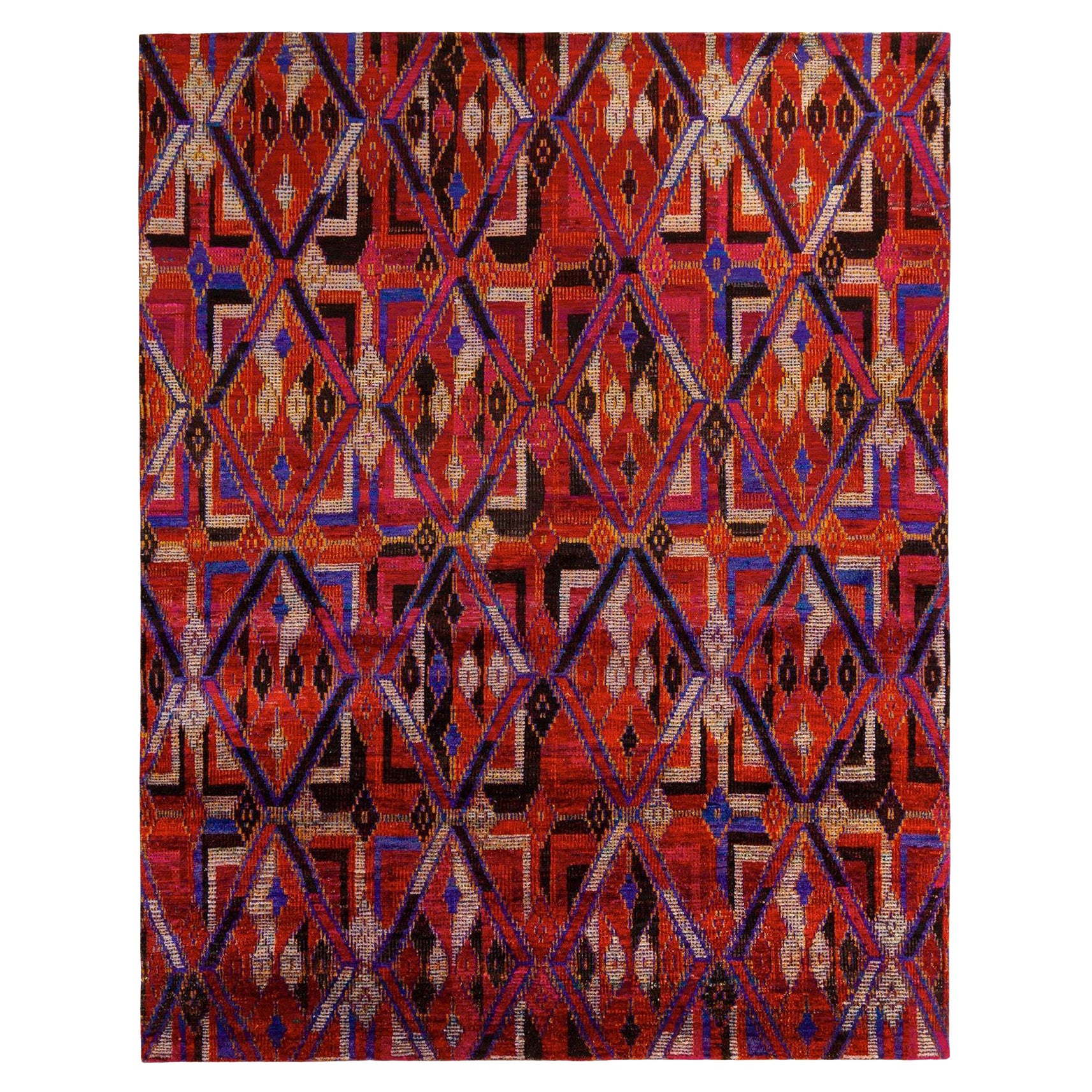 Alfombra moderna de Rug & Kilim con motivos geométricos de rombos rojos, azules y negros