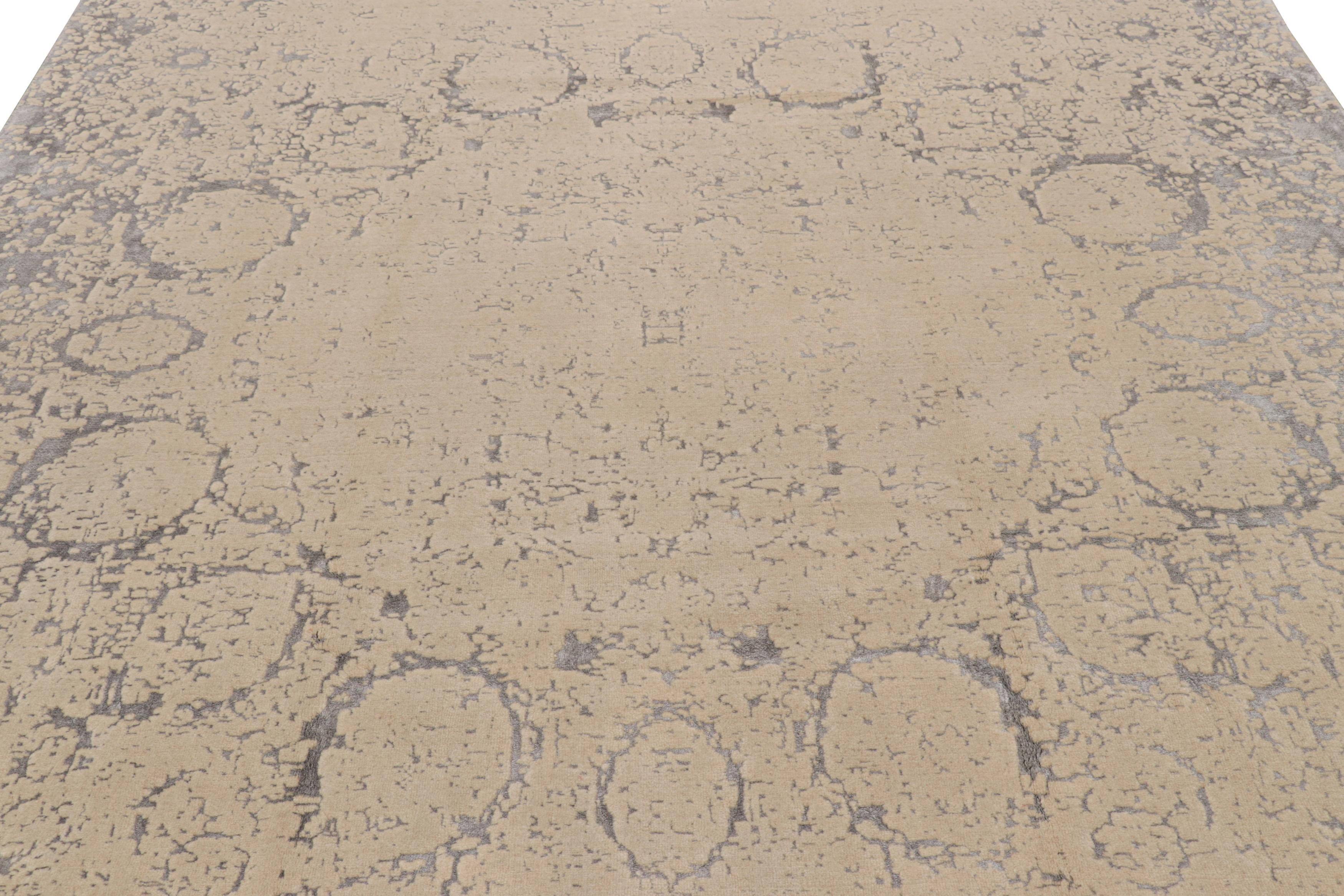 Hand-knotted in wool, this 8x11 modern rug by Rug & Kilim enjoys an abstract design with a subtle inspiration from antique and vintage rug patterns.

On the Design: 

Silver-gray and cream tones underscore a muted all over design, inspired by