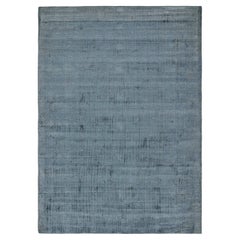 Rug & Kilim’s Modern Rug in Solid Blue Tone-on-tone Striae