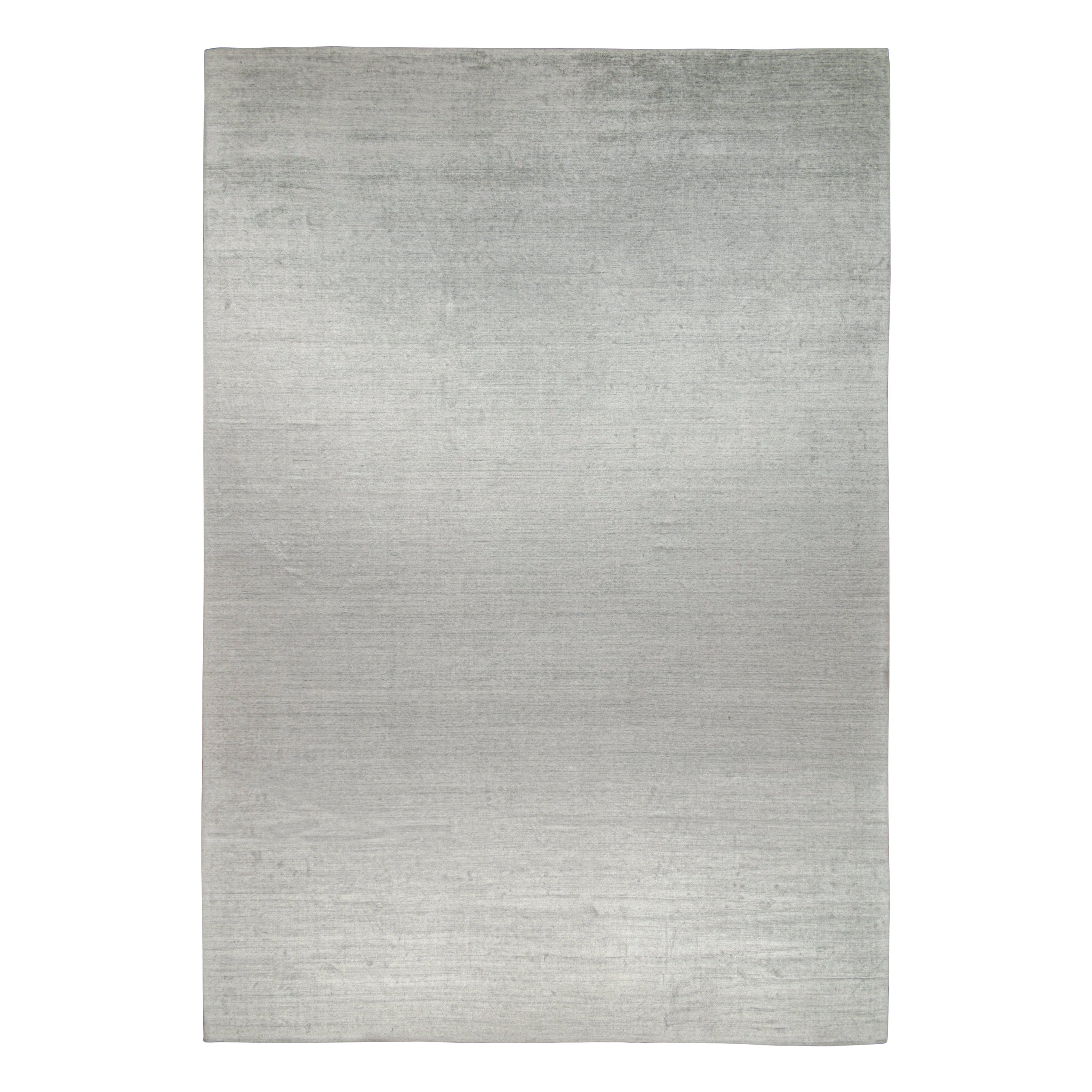Ce tapis contemporain 14x20 de la taille d'un palais est une nouvelle entrée grandiose dans la Collection Texture of Color de Rug & Kilim. Noué à la main en soie d'art et en coton. 

Les connaisseurs noteront que cette pièce est issue de notre