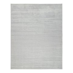 Rug & Kilim’s Modern Rug in Solid Grey and Off-White Striae