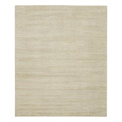 Rug & Kilim’s Modern Rug in Solid Ivory Tone-on-tone Striae
