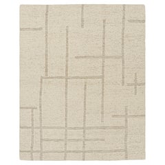 Tapis Modernity de Rug & Kilim avec motifs géométriques High-Low de couleur crème