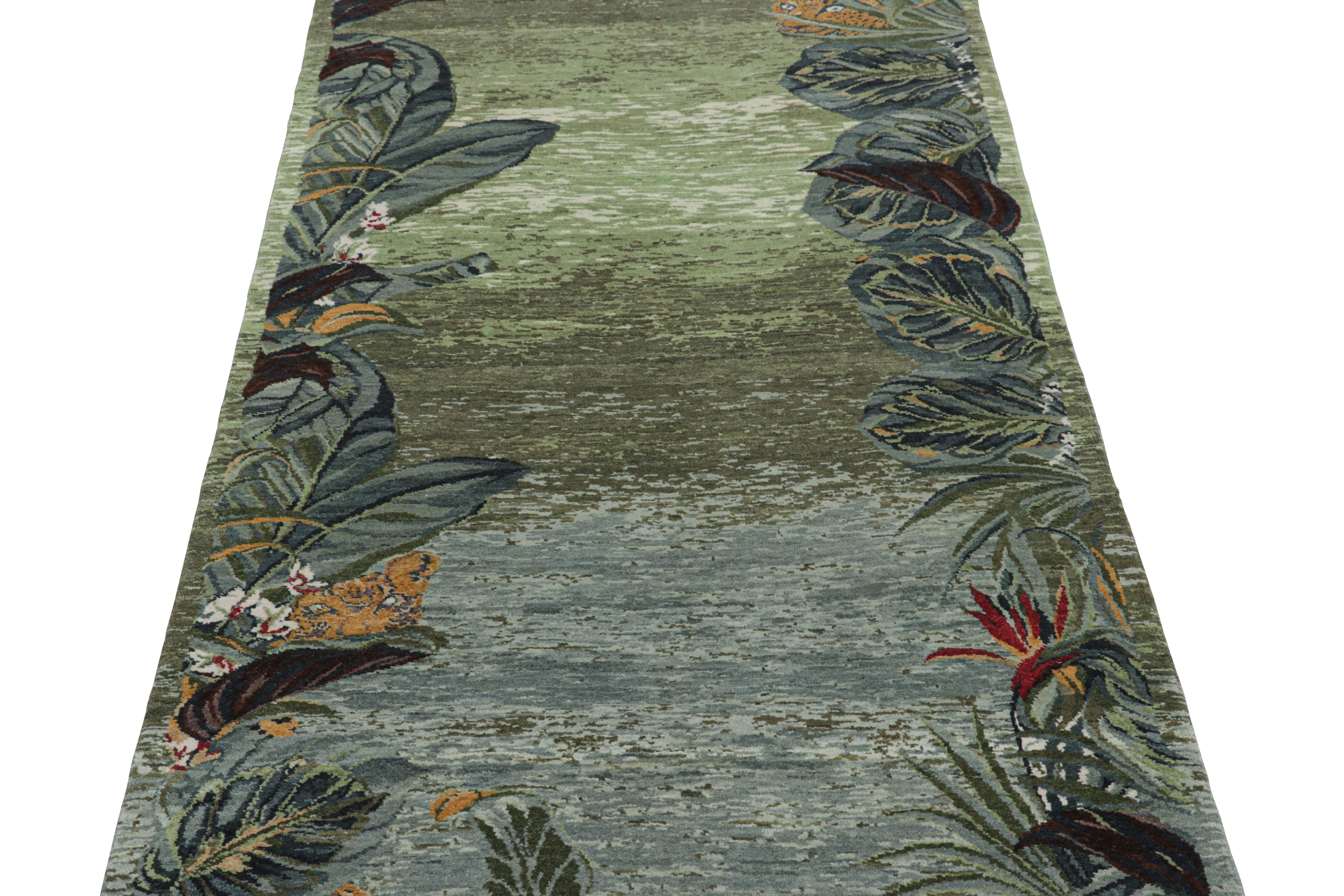 Hand-knotted in a luxurious blend of wool and silk, this 3x10 runner rug from Rug & Kilim’s Modern Collection is a bold new exploration of open field design and pictorials. 

On the Design: 

A palette of teal green and blue tones underscores both