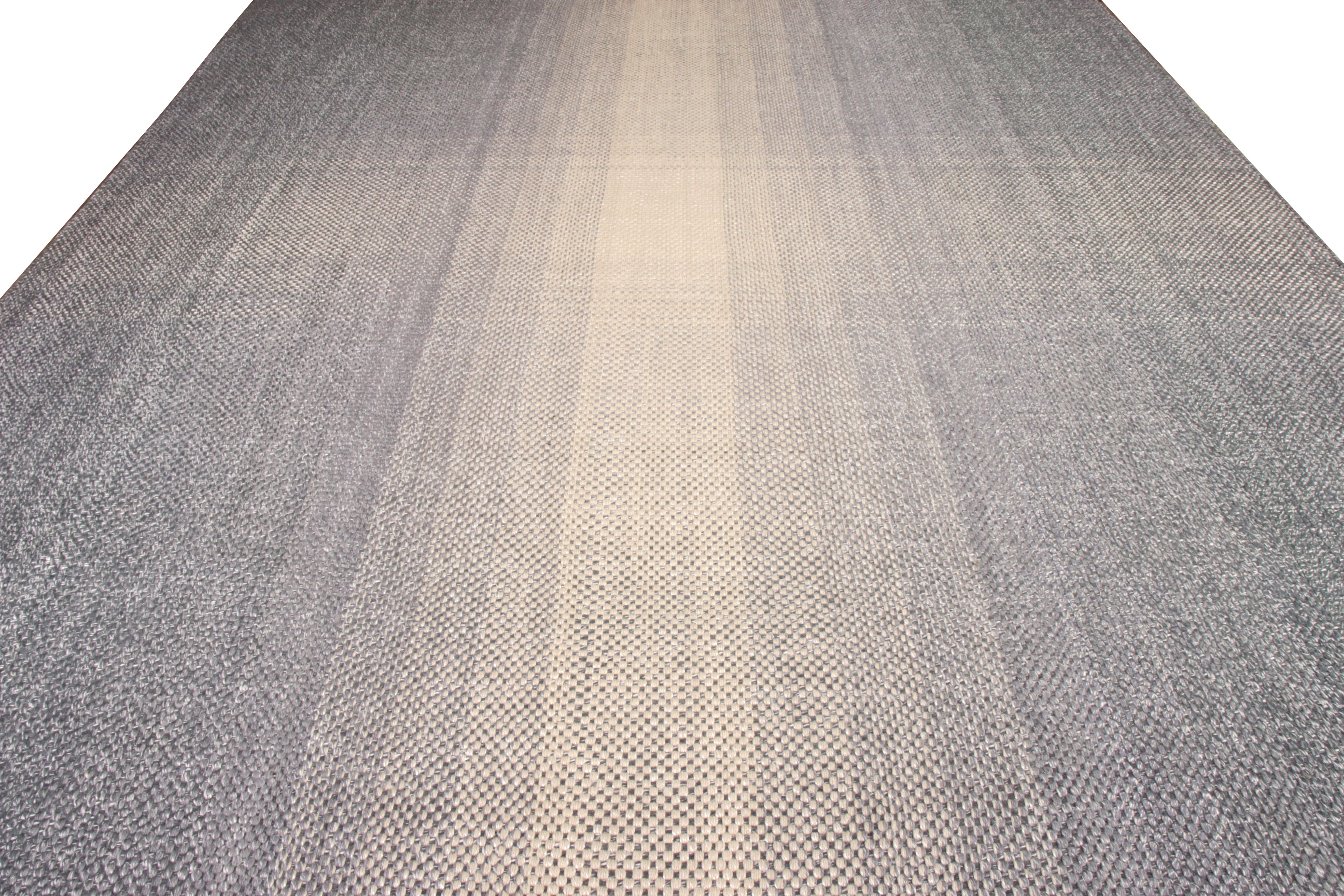 A custom rug design lending a unique addition to Rug & Kilim’s New & Modern Collection. Representing our Smart Loom style, the piece arrests attention with a mature blue and gray transitioning to white in the gradience—further enjoying an impeccable