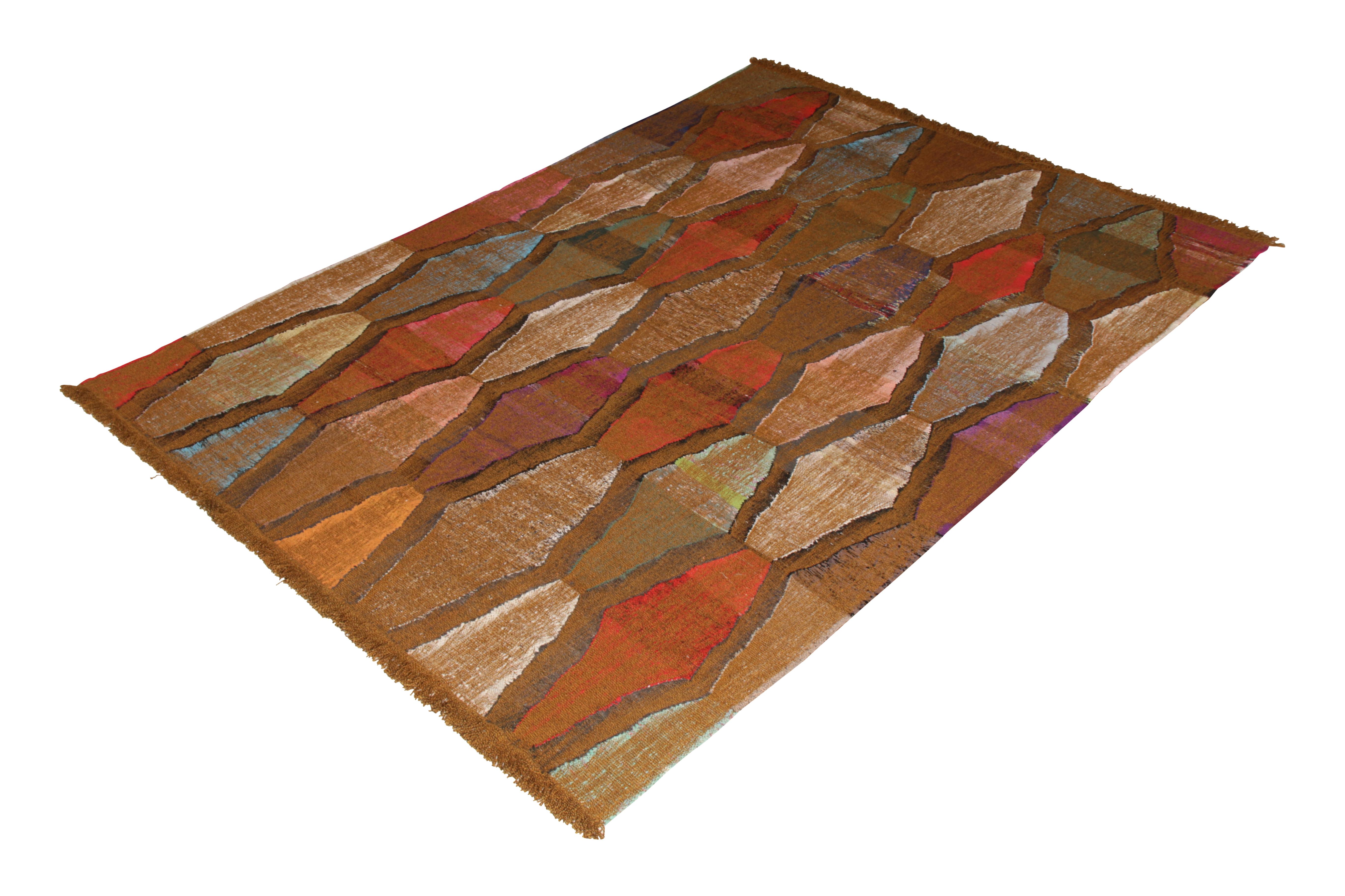 This modern Kilim represents a selection of distinct new patterns joining Rug & Kilim’s titular Kilim & flat-weave Collection, with this piece representing a subcollection uniquely handwoven from the yarns of Classic textiles and Kilims to create
