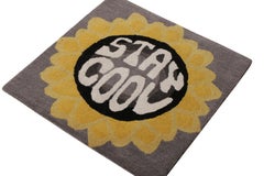 Rug & Kilim’s Modern Text Rug, Yellow and Black Floral Circle Mat