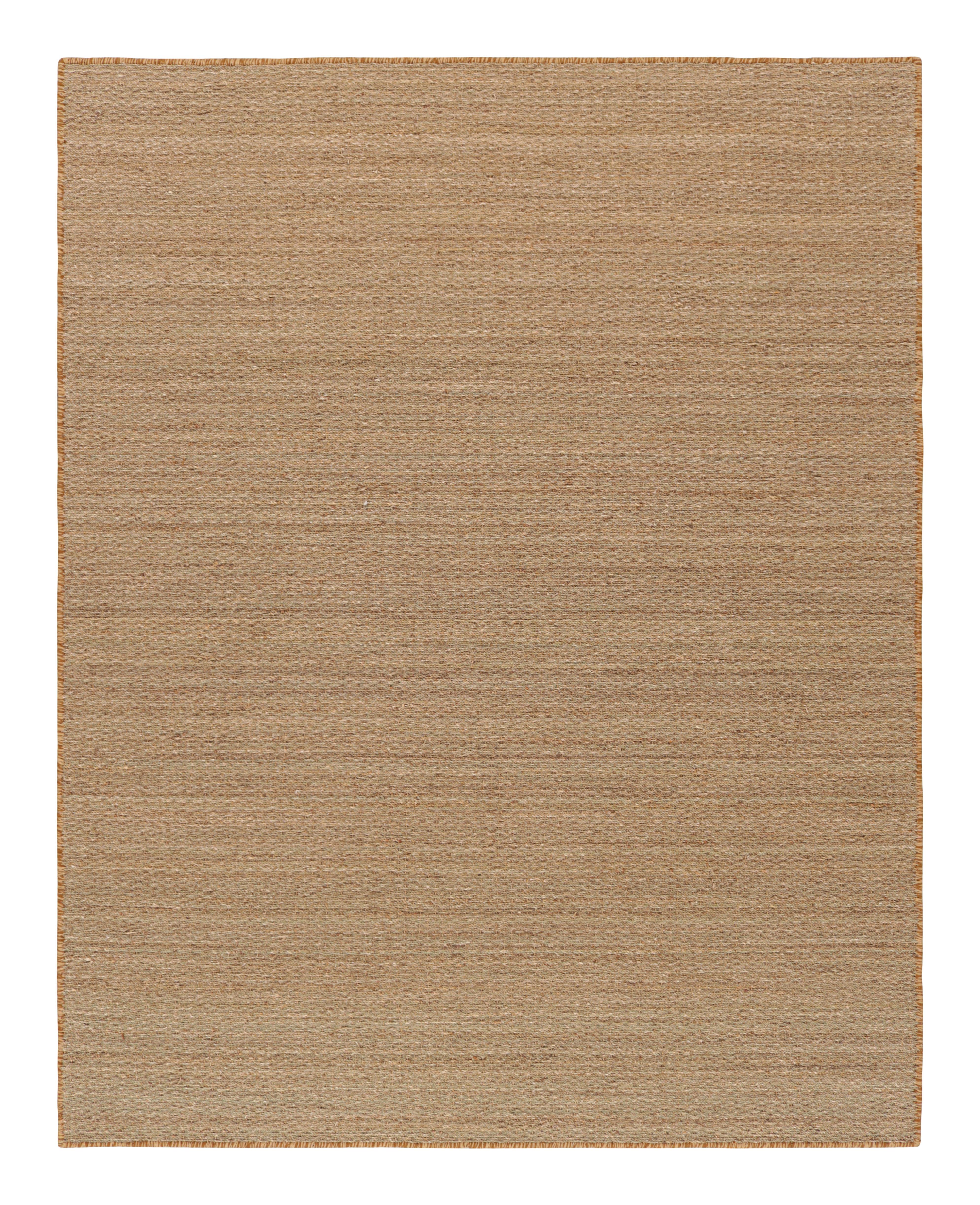 This 7x9 textural rug design by Rug & Kilim is an exciting new addition to its Texture of Color collection, made with seagrass, featuring beige and brown stripes and striae among other neutral hues and tones, with a special hand binding around the